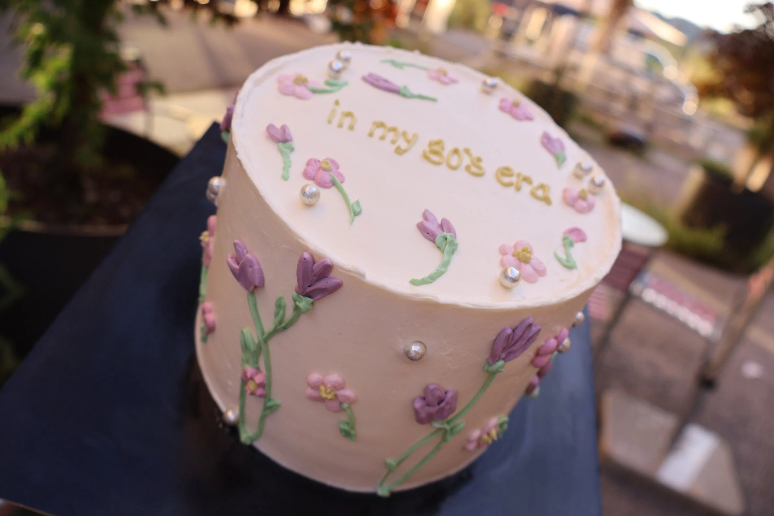 Birthday cake with flower piping decorations