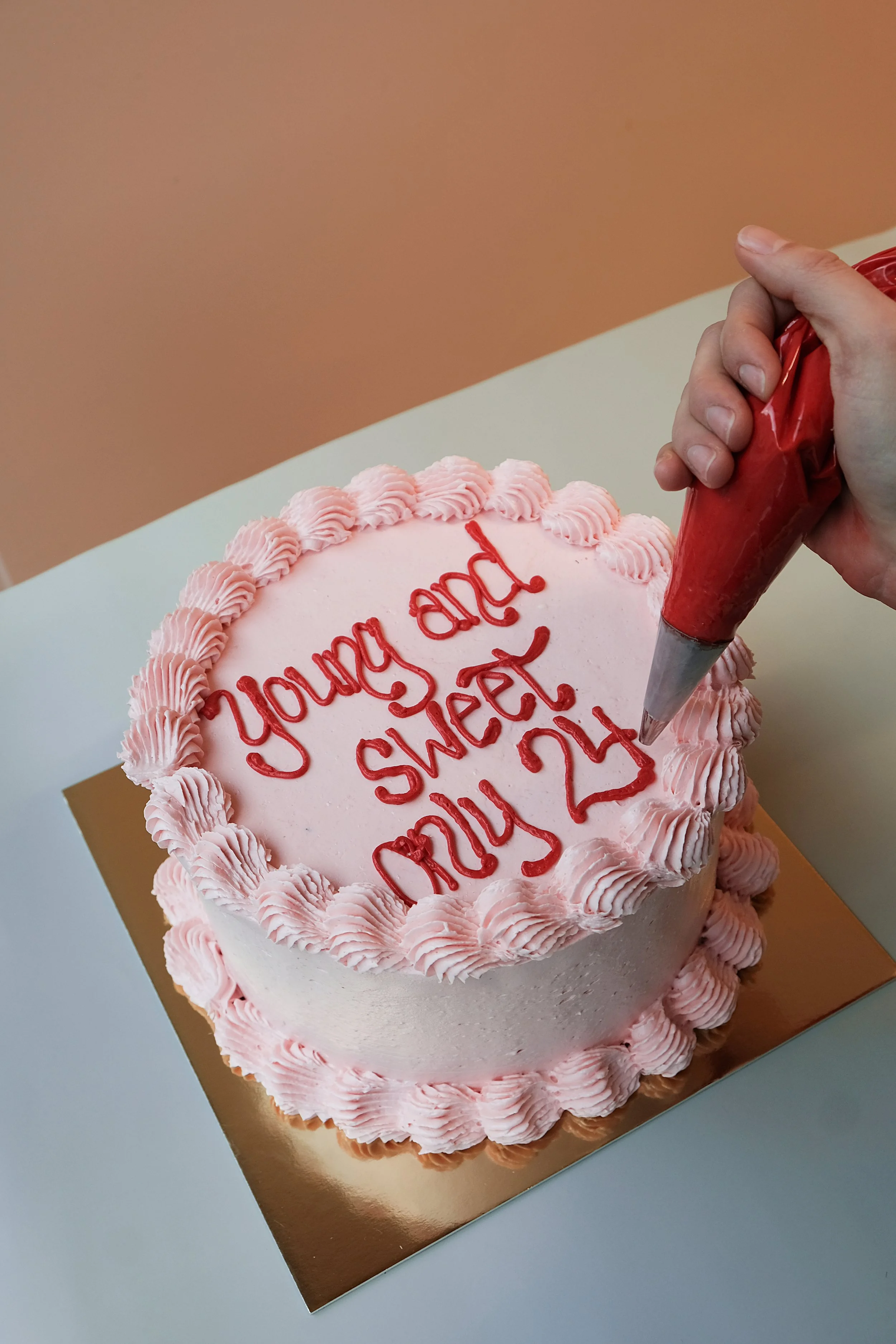 Birthday cake with vintage piping and custom lettering