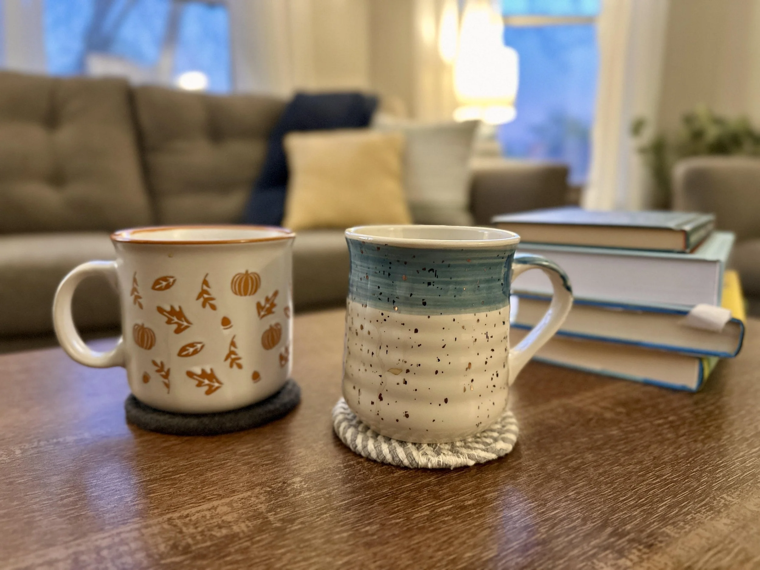 coffee cups with books in a cozy therapy office