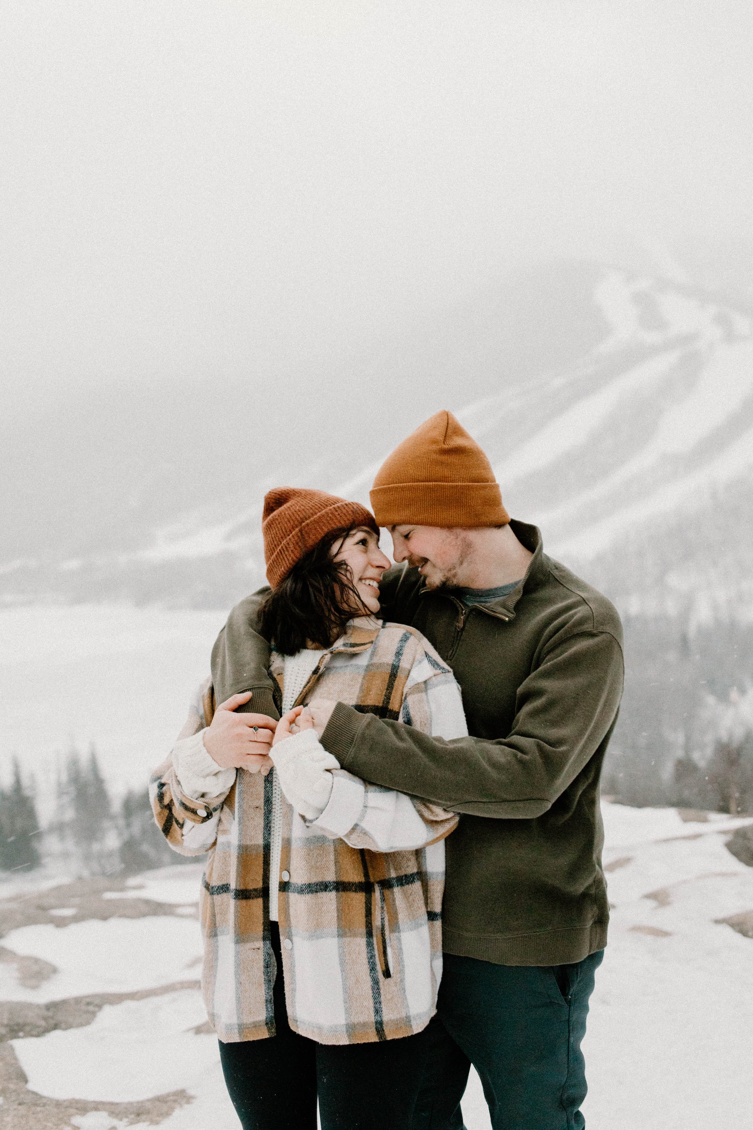 A couple took photos on top of a mountain in New Hampshire during a snow storm
