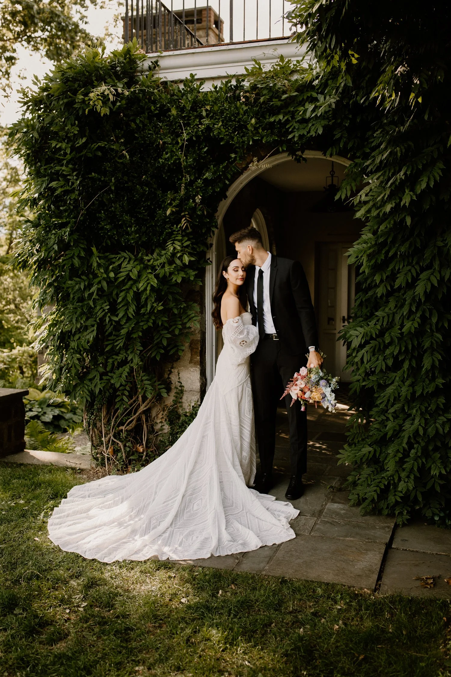Bride and Groom posed for a photo at their wedding. Wedding venue is Glynwood estates in NY
