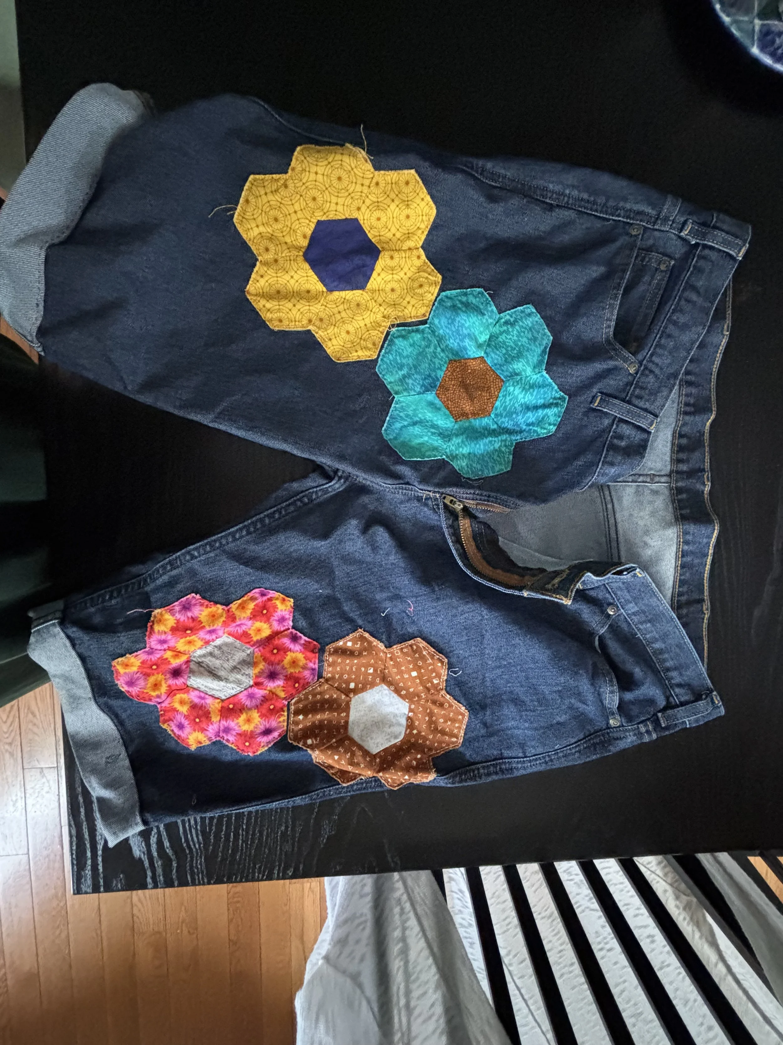 jean shorts with appliquéd hex flowers