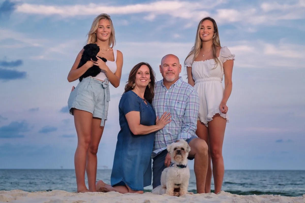  Family beach photography in Gulf Shores featuring family pets.  