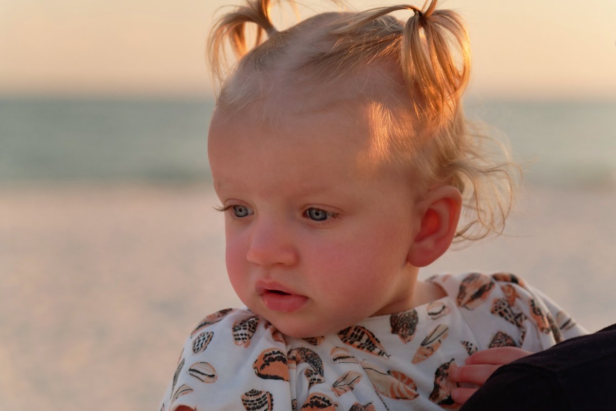  Portraits of a toddler and her first time at the beach in Fort Morgan  