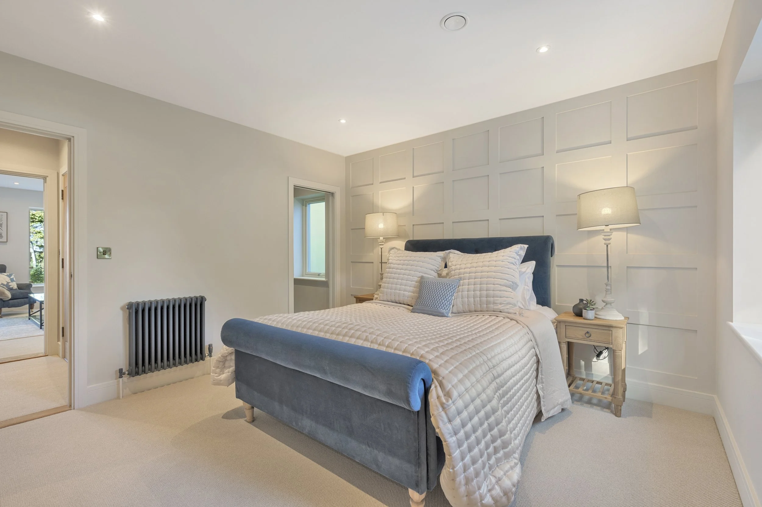 Main bedroom with panelled walls