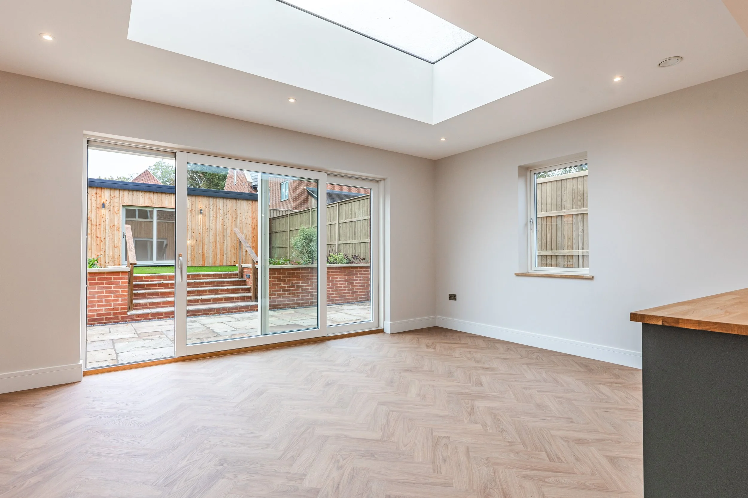 A large roof lantern covers the dining room level.