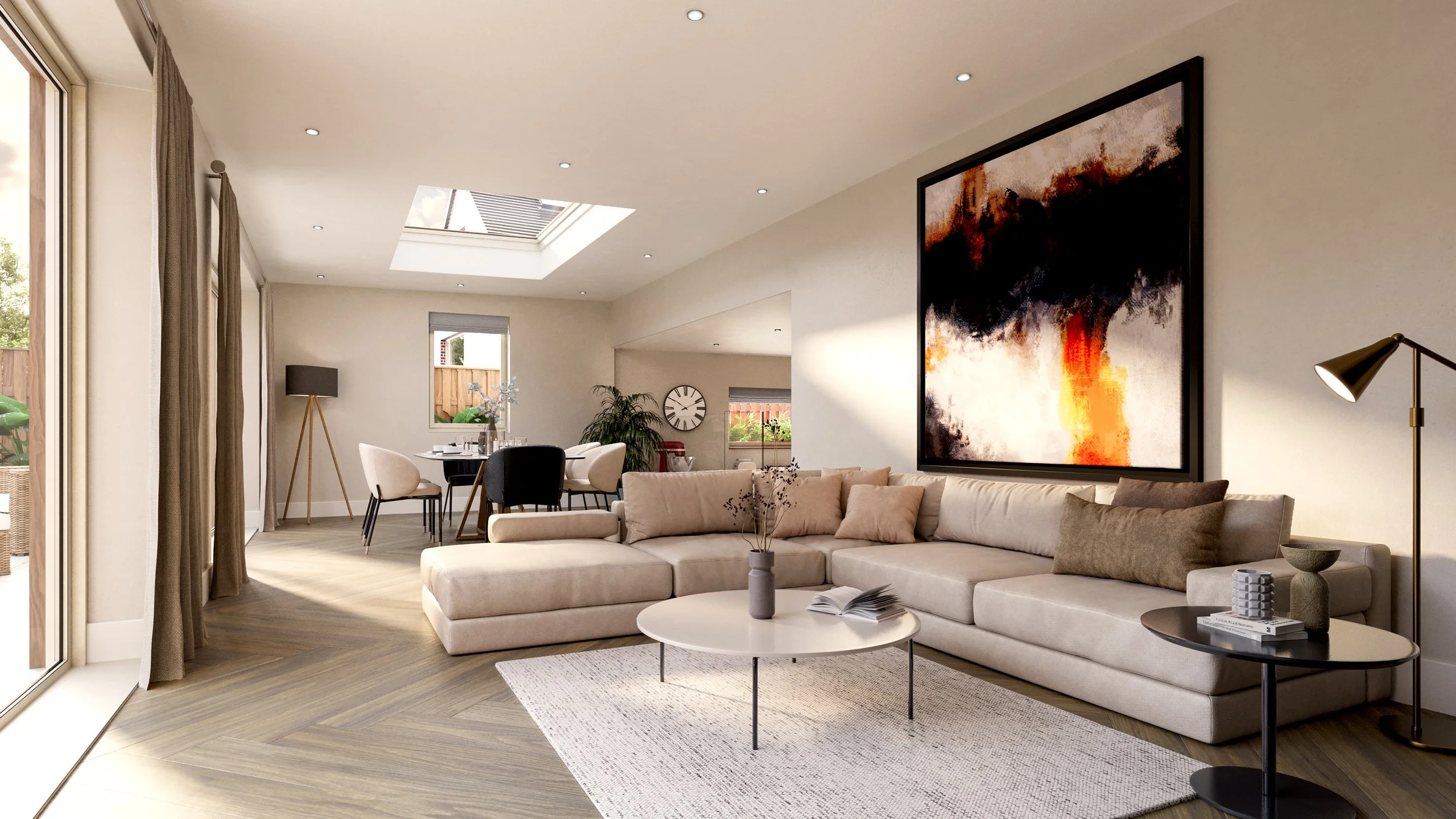 A view back across the living room to the dining area. A cozy sofa makes the most of this beautiful space looking into the garden. 