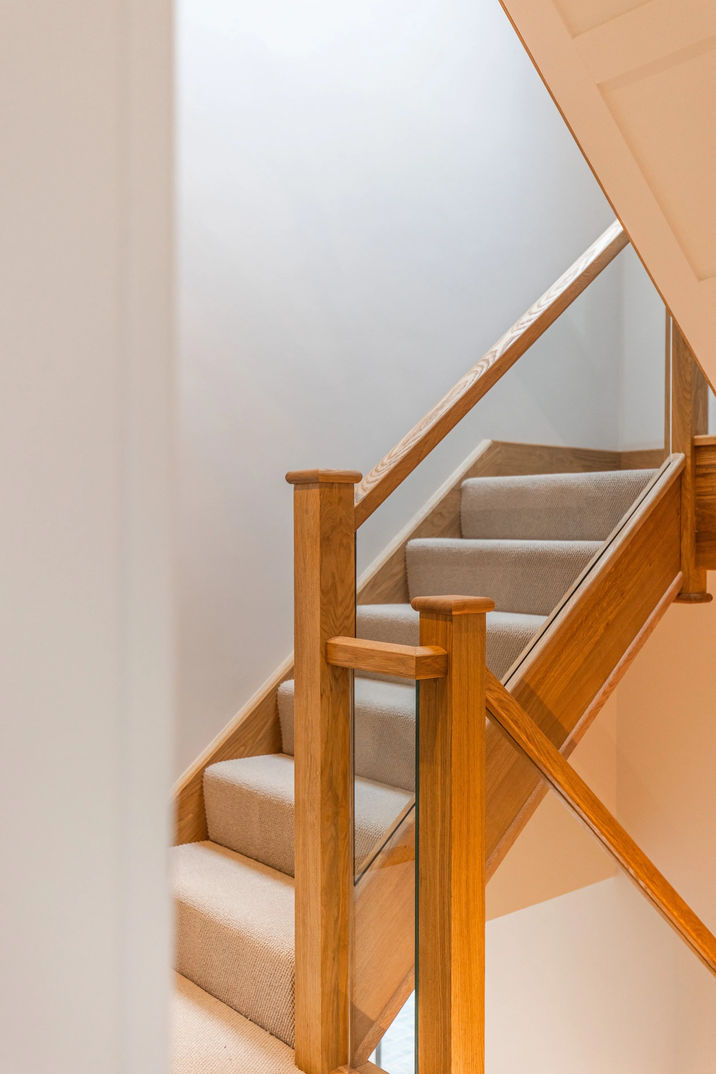 Oak staircase leading from first to second floor