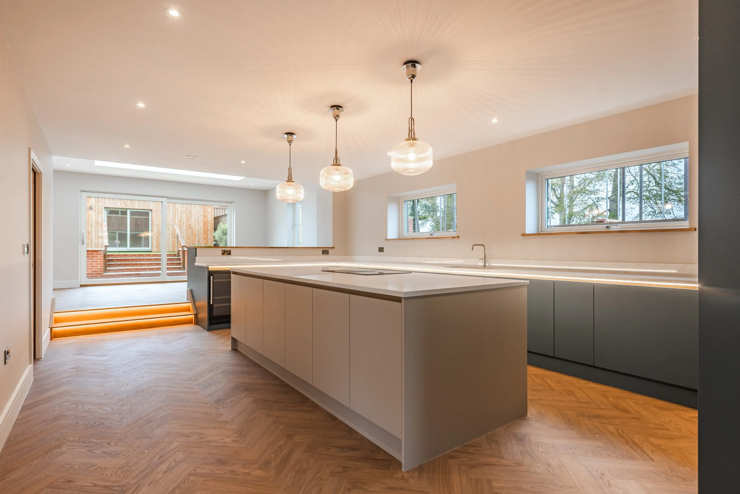 A view across the two-tone Masterclass kitchen with centre island.