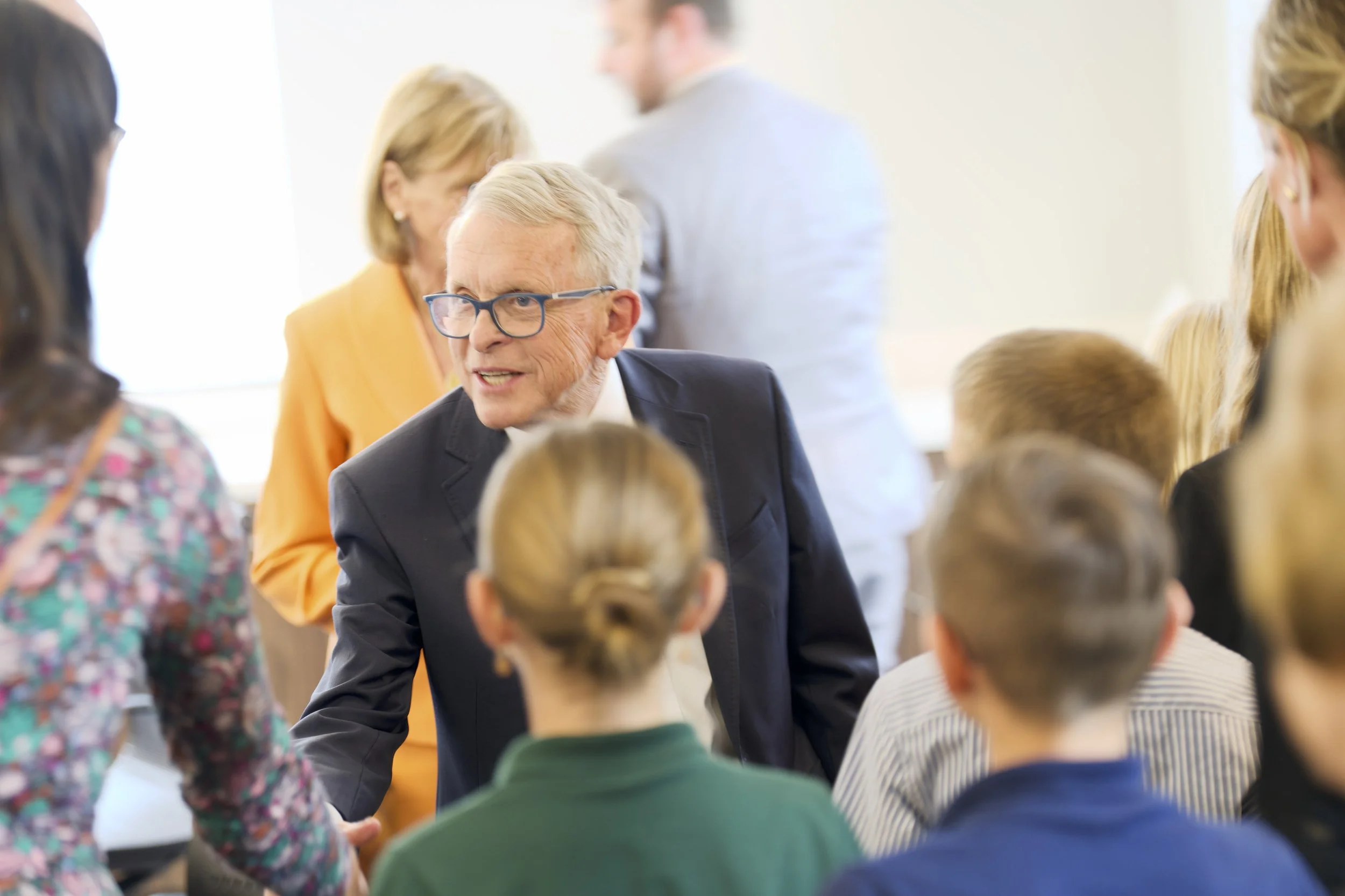 9.24.35 Dept of Education Press Conference at CCV_Mike DeWine greets parents and students.jpg