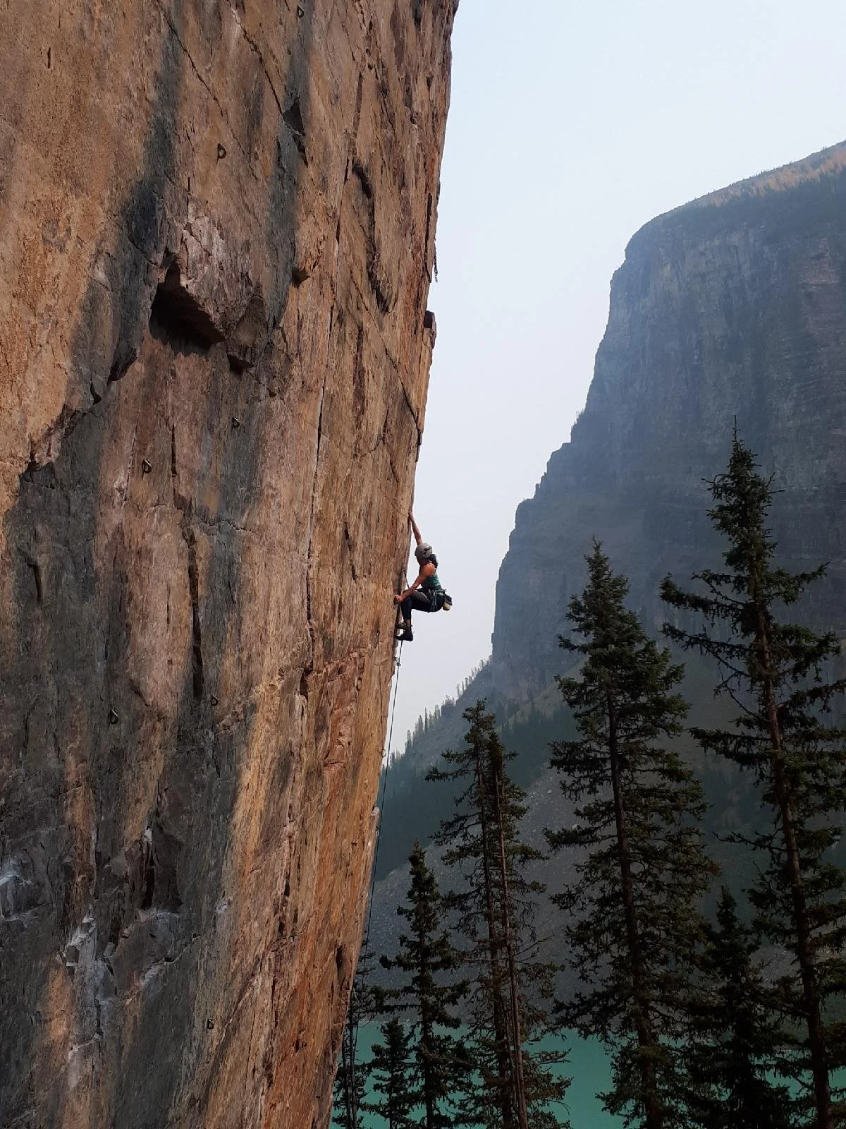 Climber with trees and lake