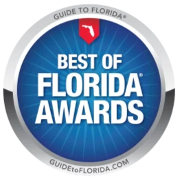 Badge logo for Florida Best of Florida Awards, featuring a blue circular design with a red state of Florida icon at the top, surrounded by a grey border with the text 'Guide to Florida' and 'GUIDETOFLORIDA.COM'.