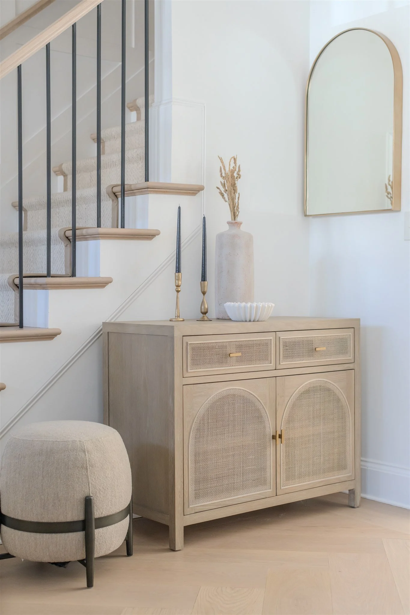 styled-entryway-with-arched-console-and-modern-mirror.jpg