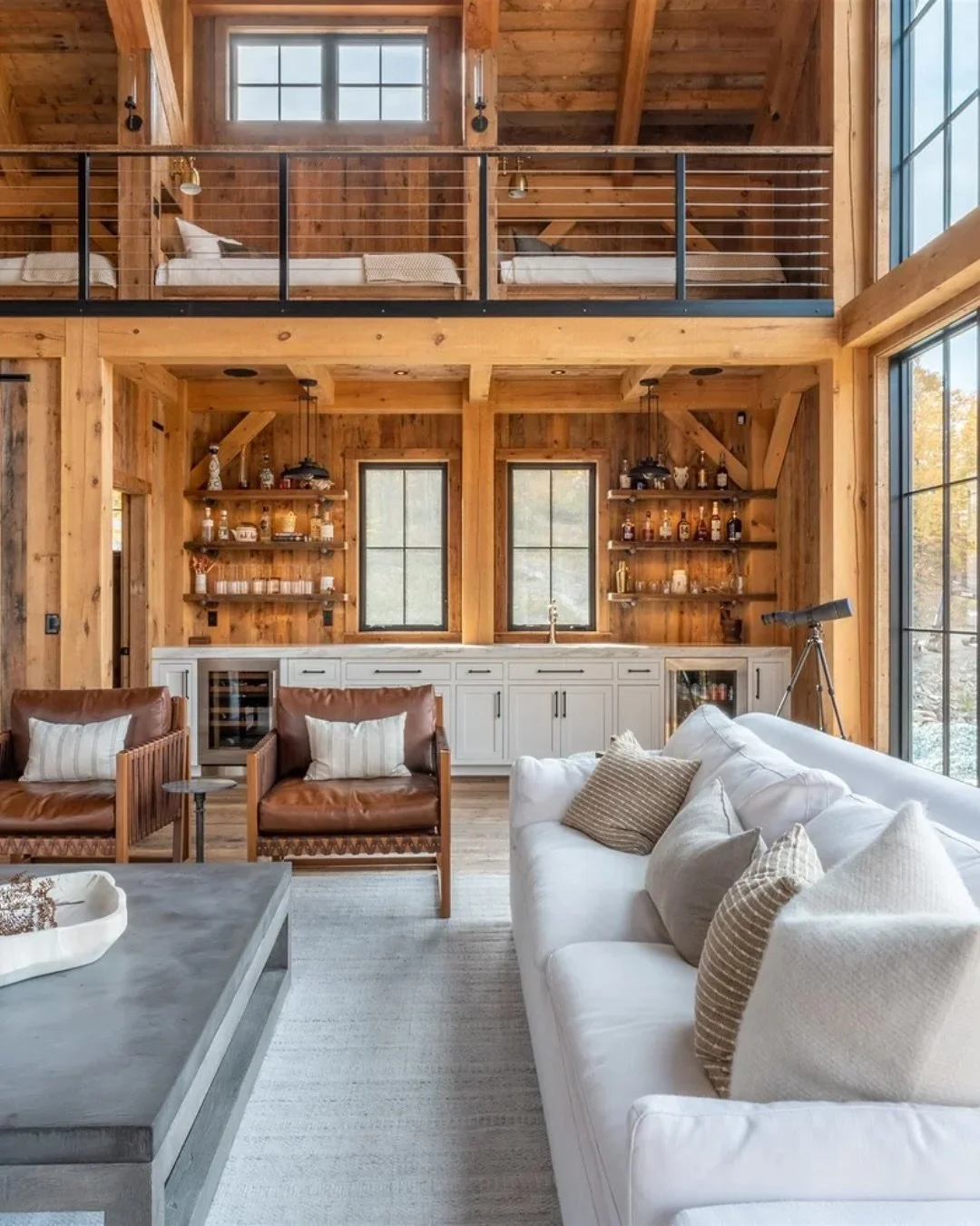 🍁 When fall unintentially becomes your color palette. 
Warm woods, layered textures, and rich earthy tones. The aesthetic we created to catch a feeling perfectly matches view outside these Vermont windows. The reclaimed barn wood walls set the tone.