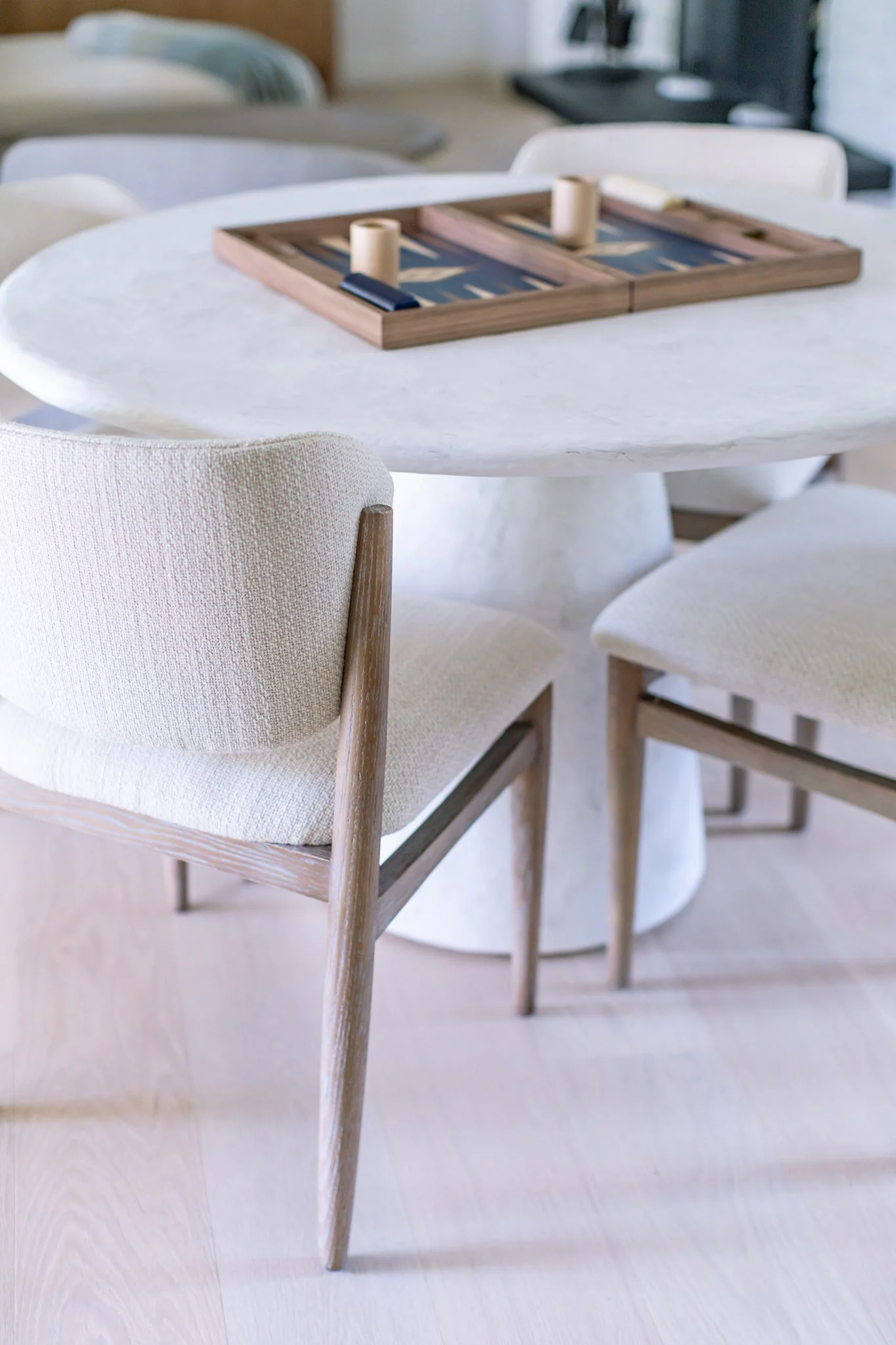 round-marble-dining-table-upholstered-dining-chairs.jpg