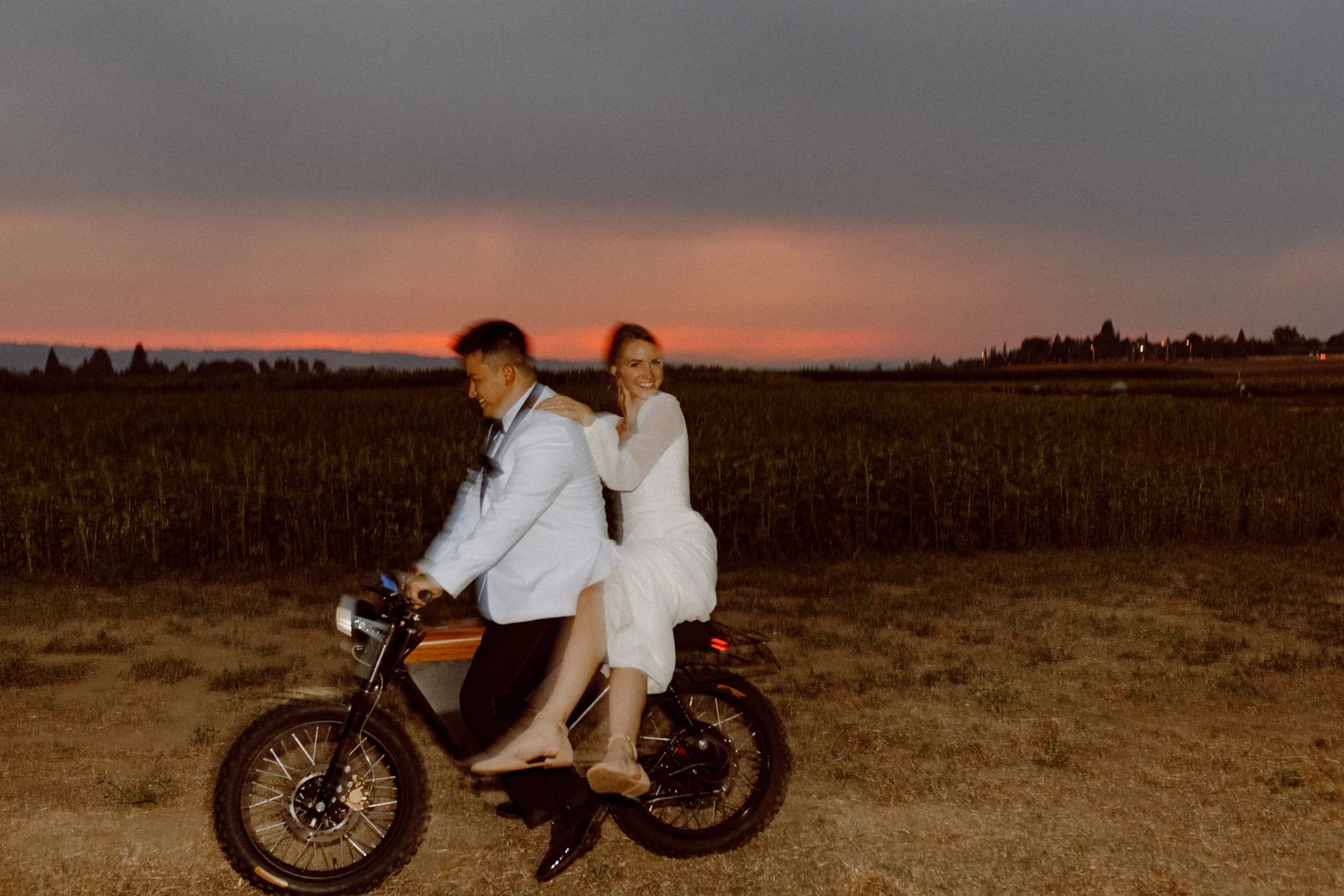 Golden hour wedding portraits of newly married couple near Chesapeake Bay