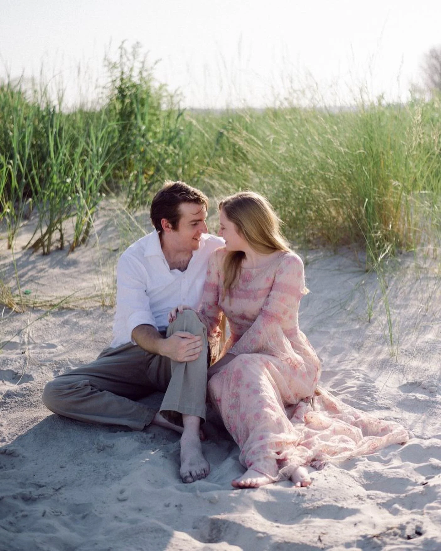 These lovebirds have lived a full life so far; I have had the privilege to photograph big milestones in their life but I still love going back  to their first anniversary and our time tucked away on #topsailisland for their coastal anniversary sessio