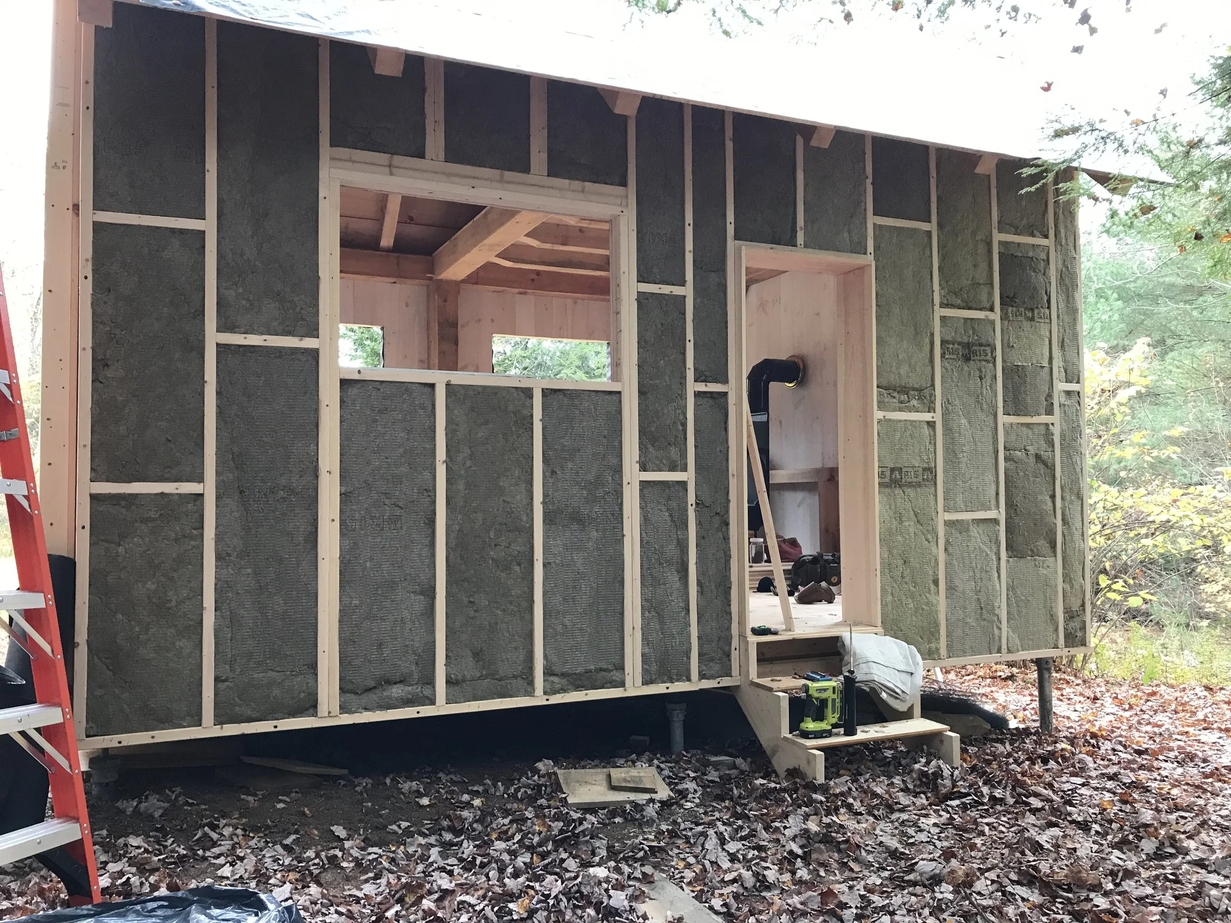 Rockwool insulation fills the spaces.