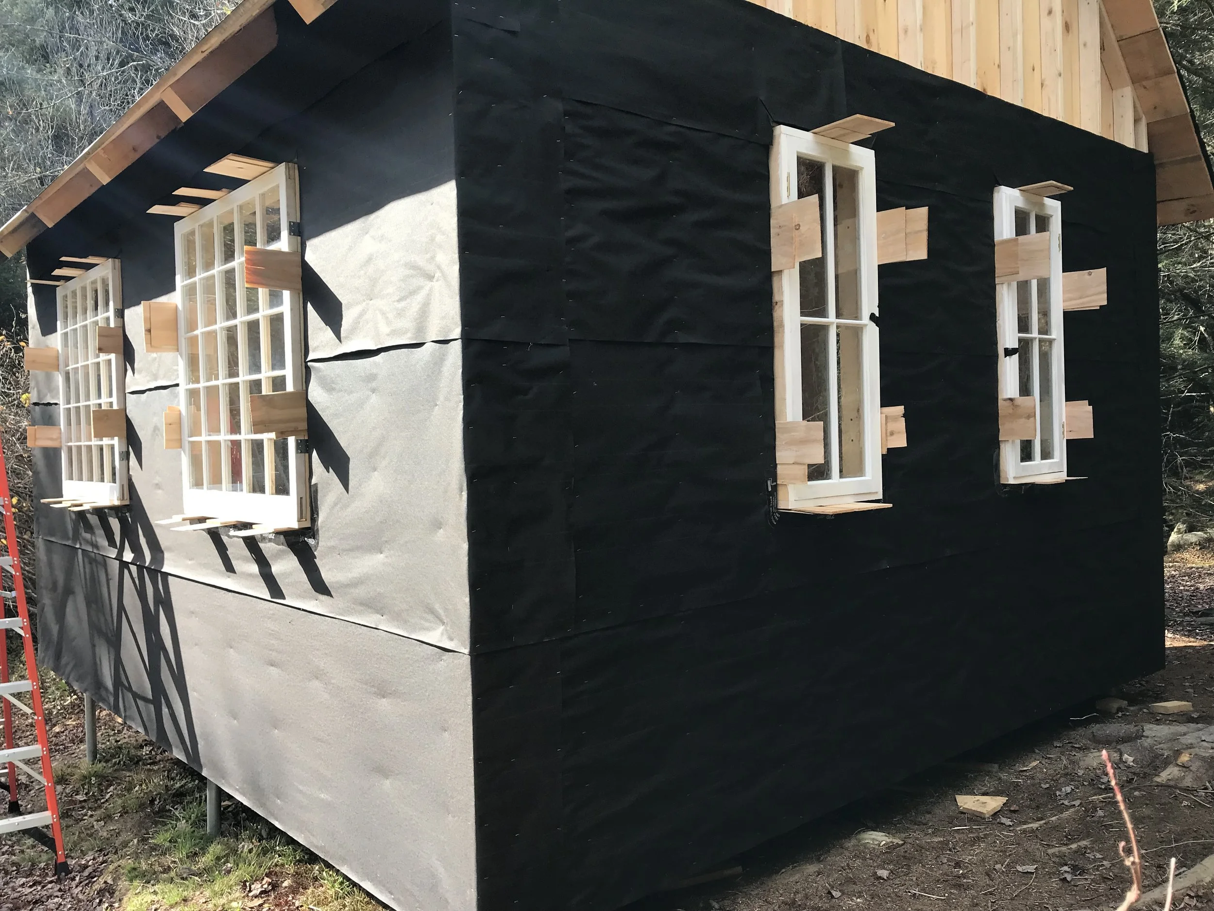 I used tar paper to wrap the cottage, it felt like a more environmentally friendly choice.