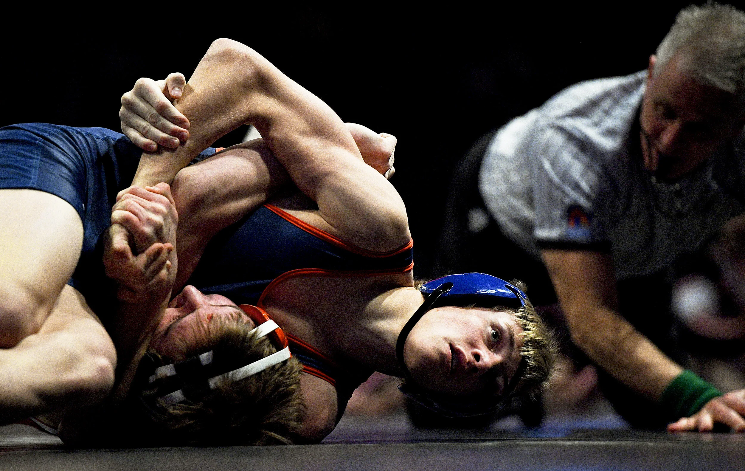 American Leadership Academy's Quenton Mortimer holds down South Sevier's Triston Fillmore as they wrestle in the 126-pound weight class during the UHSAA 3A and 4A State Wrestling Championships on Saturday, Feb. 10, 2018, at the UCCU Center in Orem, U