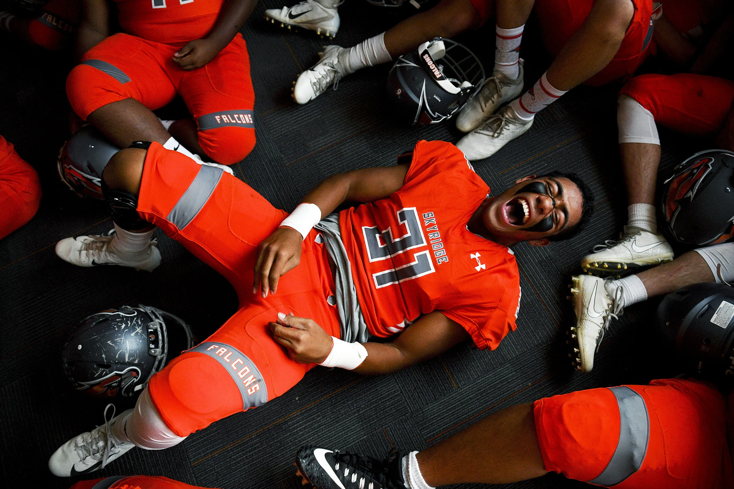 Skyridge tight end Ioholani Raass (31) shouts to pump up his teammates before a game between the Skyridge Falcons and the Lone Peak Knights held Thursday, Aug. 23, 2018, at Skyridge High School in Lehi, Utah. 