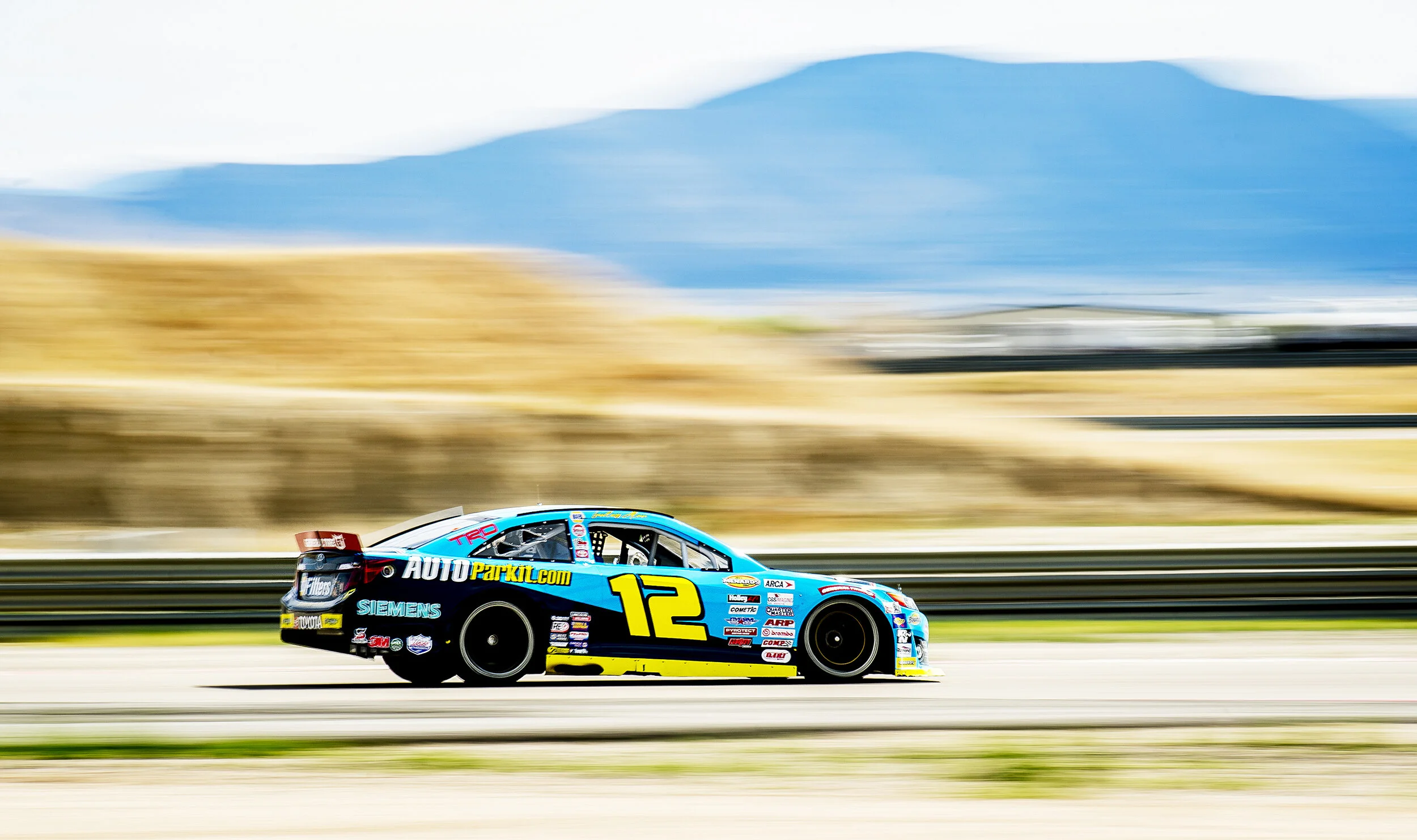 Lawless Alan, driver of the #12 AUTOParkit Toyota,  competes during the first ENEOS/Sunrise Ford Twins presented by West Coast Stock Car Hall of Fame race for the ARCA Menards Series West at the Utah Motorsports Campus in Tooele, Utah, on Saturday, J