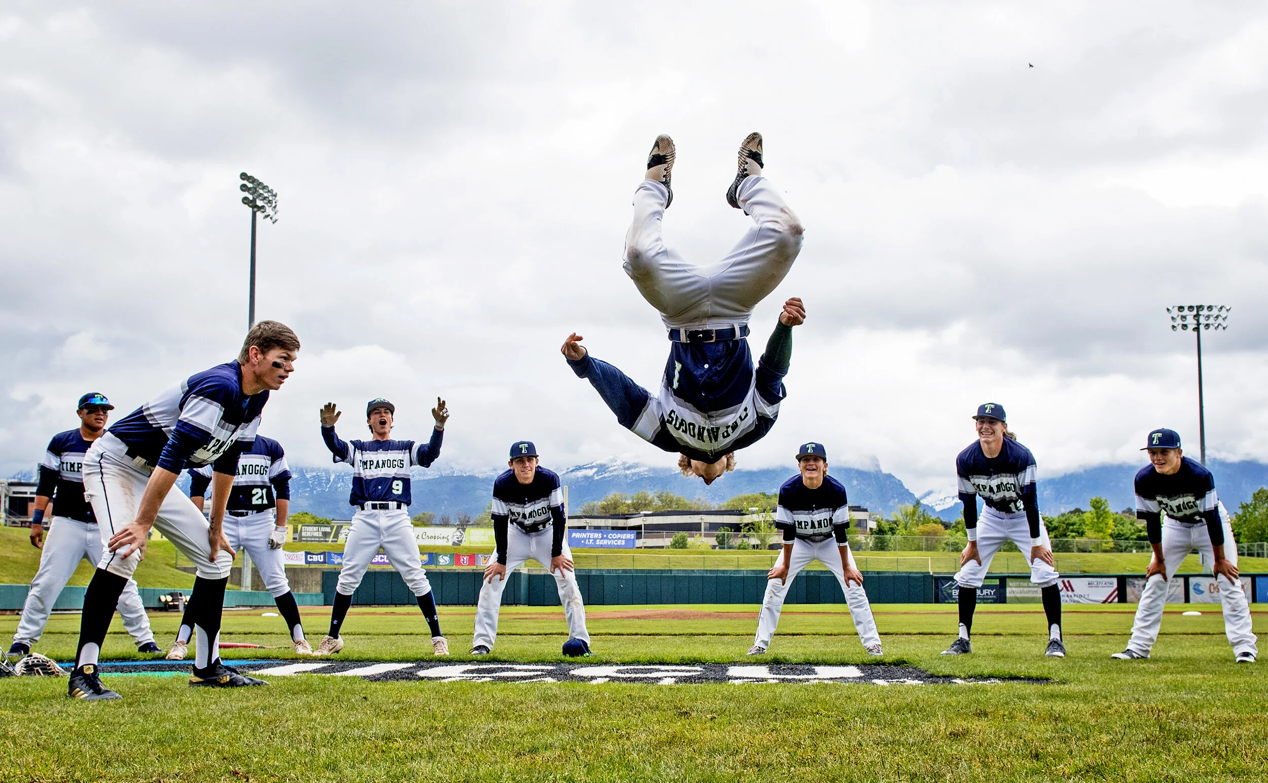 Timpanogos' Zach Jenkins (1) does a backflip to pump-up his teammates before the UHSAA 5A Baseball State Championship game between the Timpanogos Timberwolves and the Cottonwood Colts held Friday, May 24, 2019, at UCCU Ballpark in Orem, Utah. Timpano