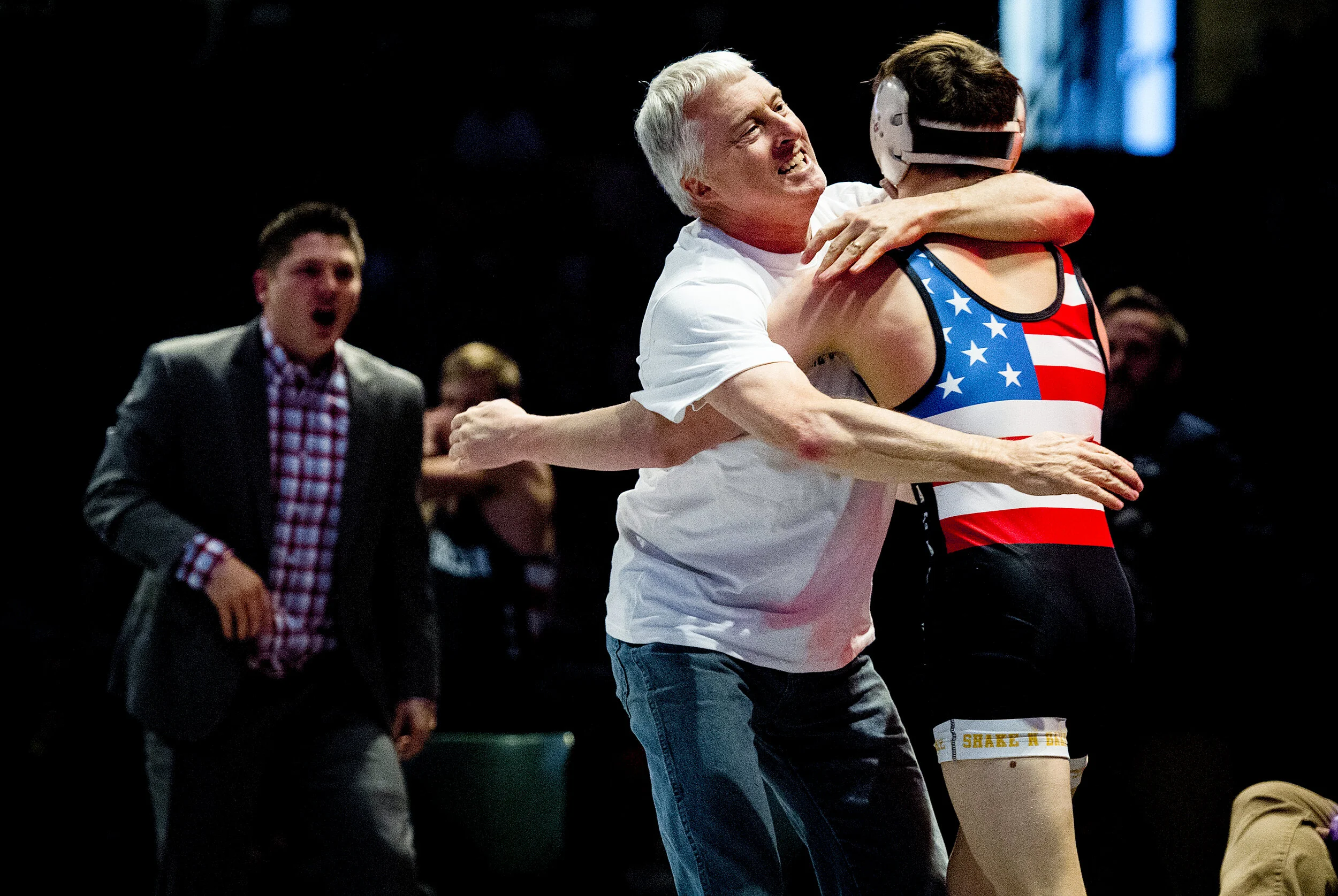 Gordon Miner hugs his son, American Leadership Academy's Rhett Miner, after Rhett defeated Juab's Conner Ingram in the 126-pound weight class during the UHSAA 3A State Wrestling Championships held Saturday, Feb. 16, 2019, at the UCCU Center in Orem, 