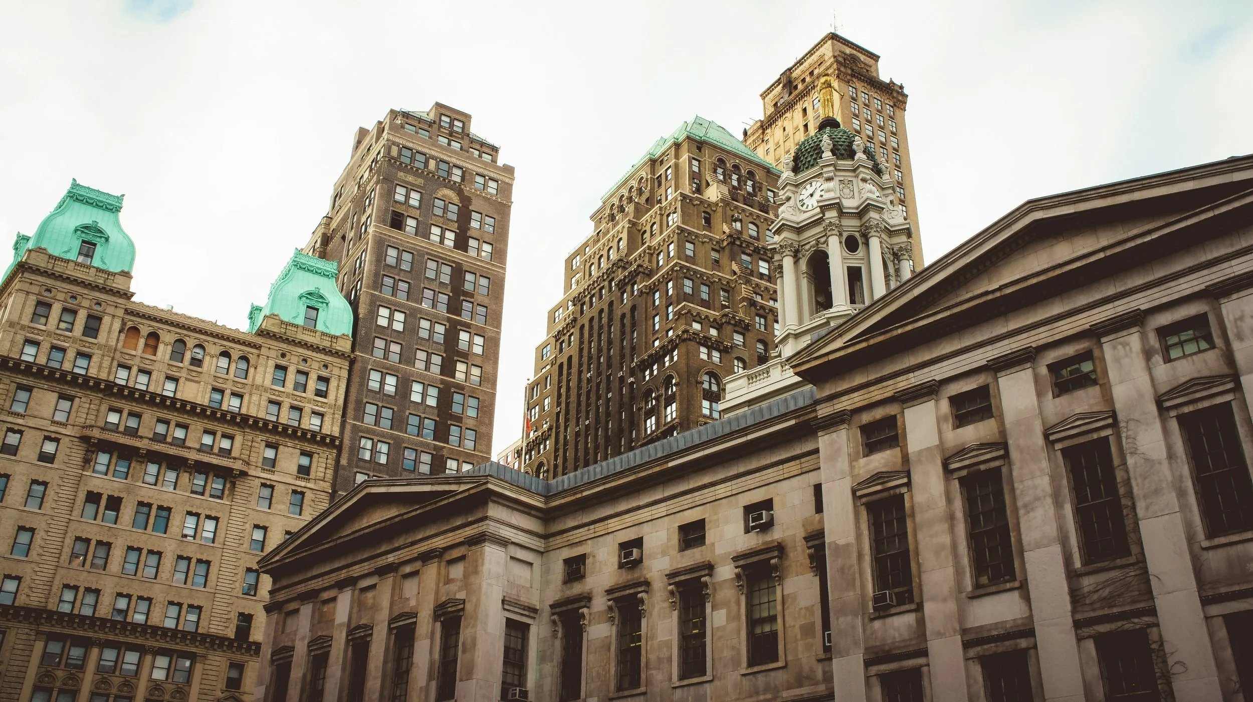 Municipal buildings in Downtown Manhattan, photo by Arnaud Padallé.