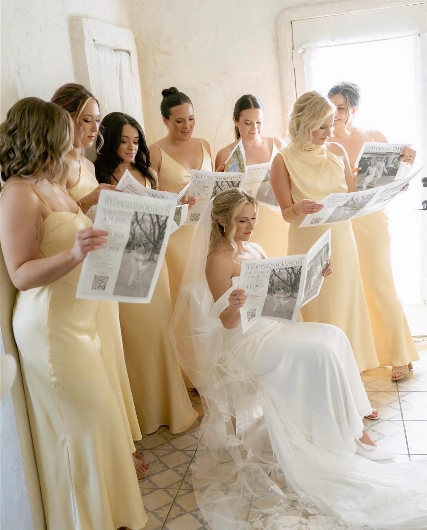 Yellow bridesmaid dresses will forever remind us of Andie Anderson (IYKYK) and we&rsquo;re not mad at it.✨ How stunning did these beauties look?! And how cute are those newspapers?

Photography: @mikeloandlindsey 
Bride: @grimriecher 
Wedding Dress: 