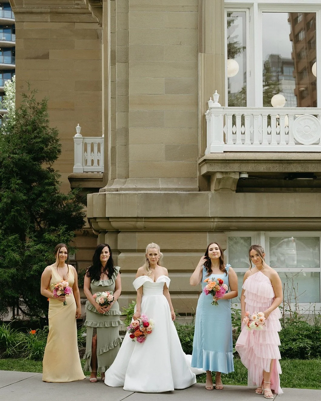We&rsquo;re still swooning over our beautiful bride @kennedypochapsky in the Athos gown by @pronovias!✨ We&rsquo;re obsessed with having their getting ready outfits match the colours of their bridesmaids dresses, how fun is that?!

Photography: @_kat