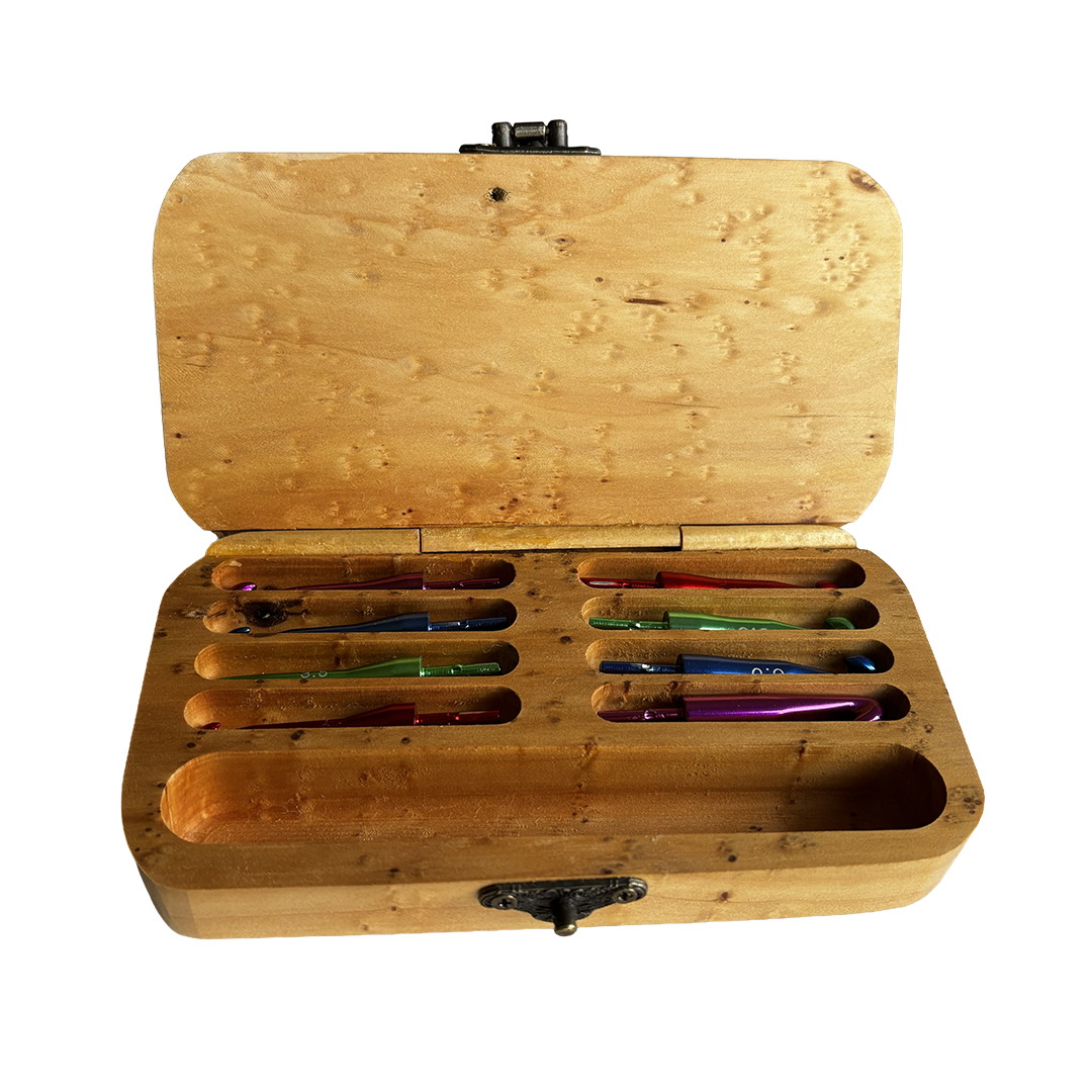 Inside view of wooden Crochet Hook Set made by Wildwoodpens from Birdseye Macrocarpa. Showing eight interchangeable crochet hooks