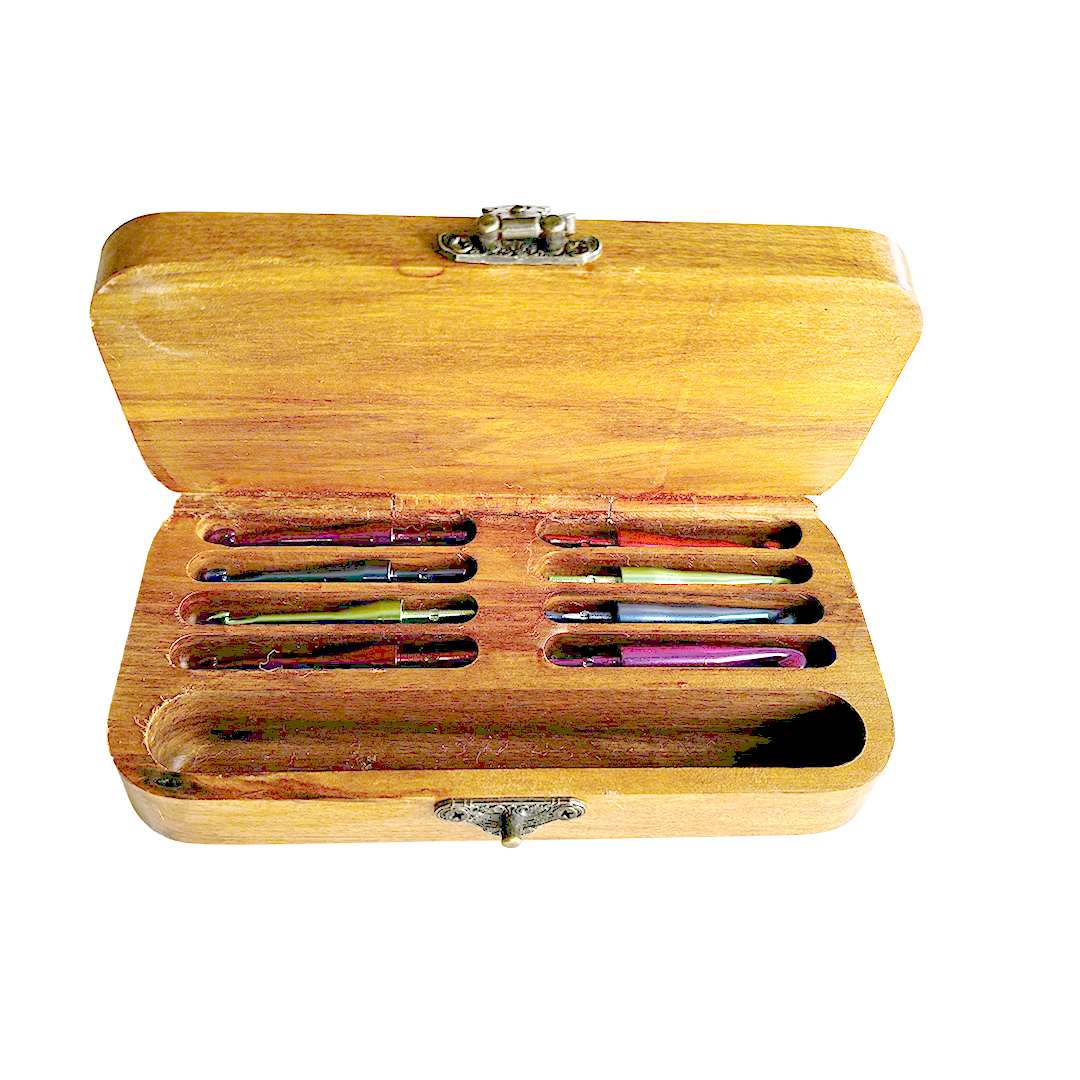 Inside view of a wooden Crochet Hook Set made by Wildwoodpens from Rimu. Inside are eight interchangeable crochet hooks