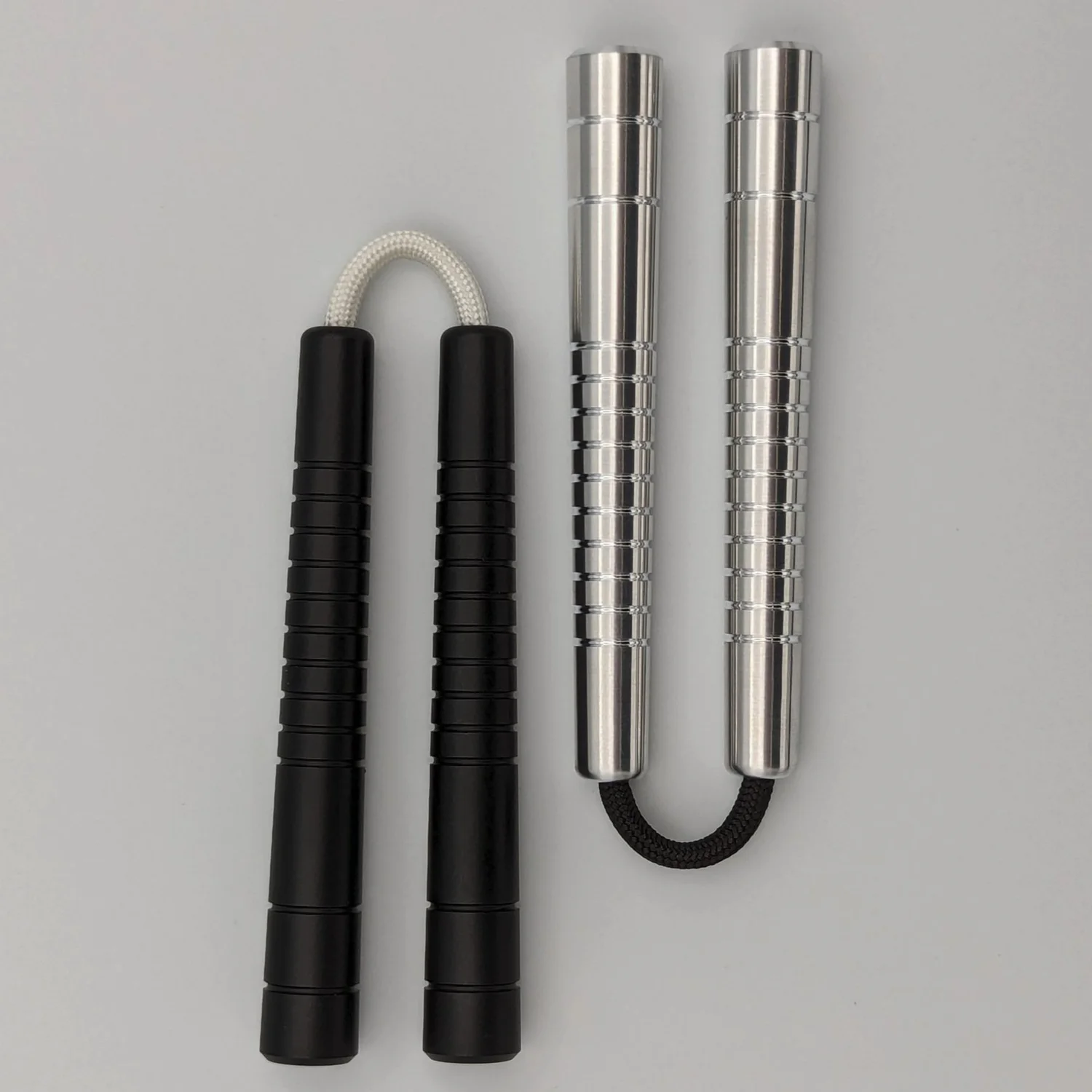 Jimpy Designs ThumbChuck Gundams (Ti): Mini Nunchuck Skill Toy — Jimpy Designs