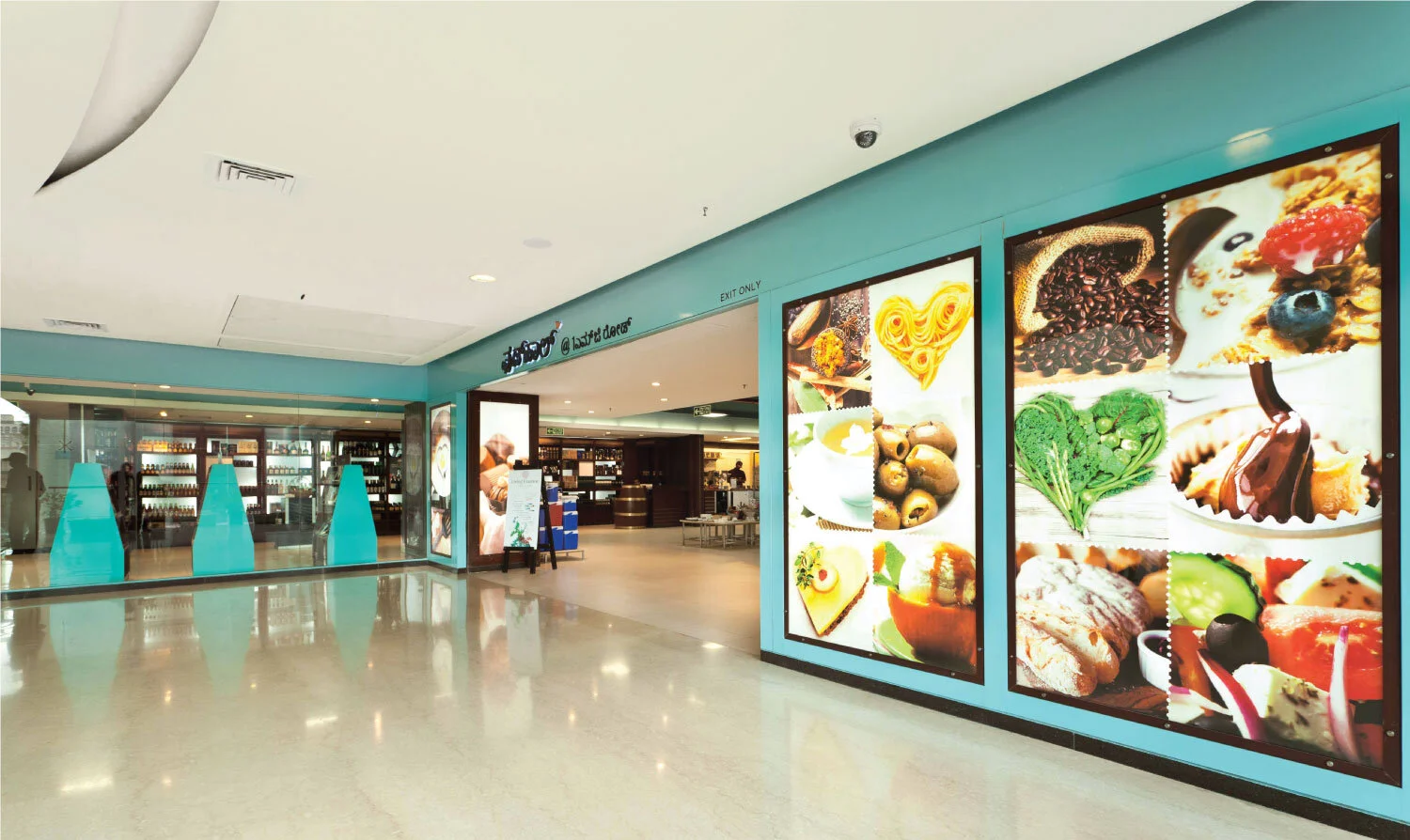 Large enticing visuals at the entrance to draw customers in