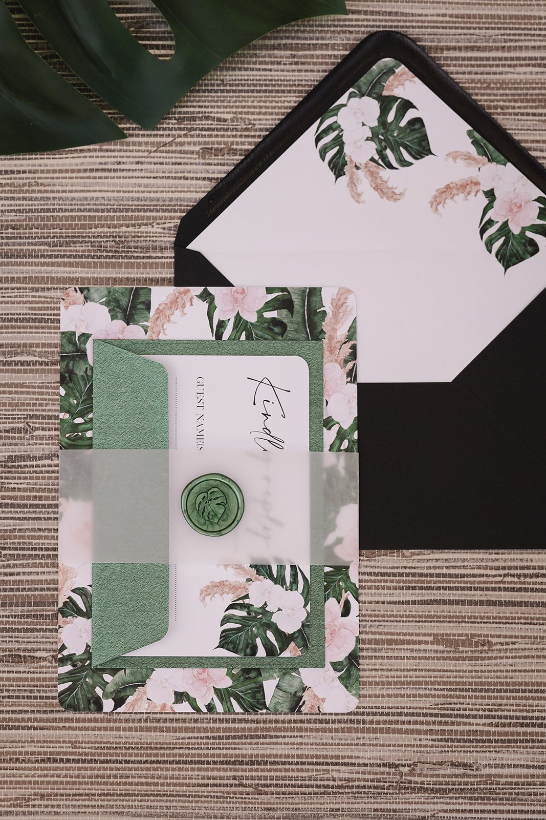 Day invite set with Rich Black and Monstera Green envelopes, with plain vellum belly band and Monstera wax seal