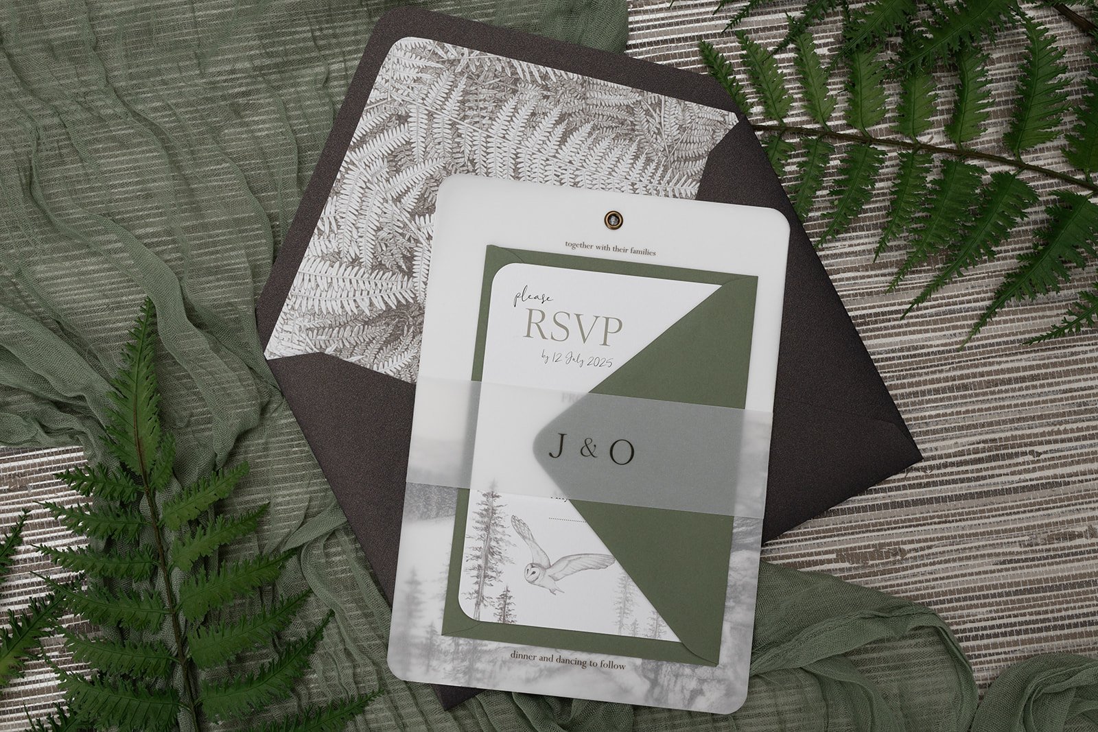 Day invite and RSVP bound with monogrammed initials vellum belly band.