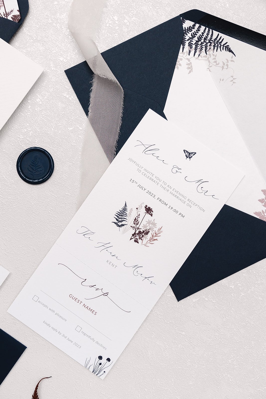 Evening invite with perforated tear-off RSVP section and lined 'Classic Navy' envelope