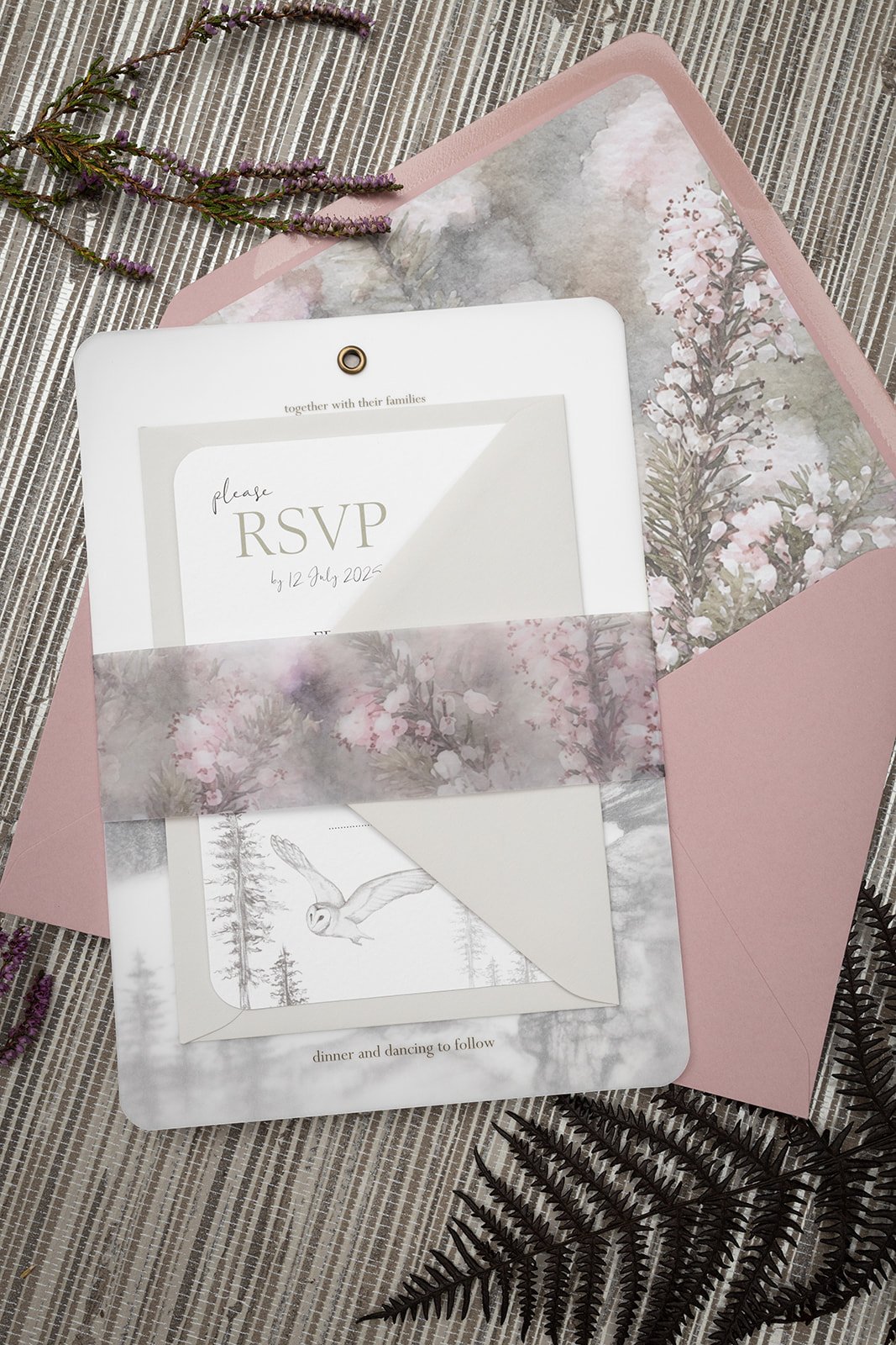 Invitation and RSVP, with day invite envelope in 'Heather Pink', with Heather Blooms liner and vellum belly band, shown with RSVP envelope in 'Limestone'.