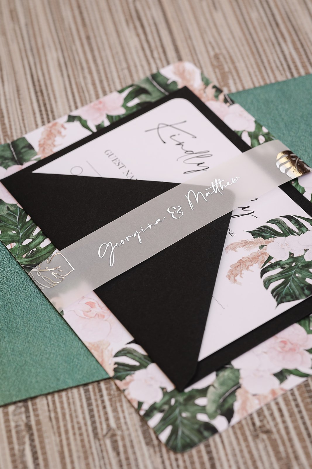 Day invite with Monstera Green envelope and silver foiled, personalised belly band