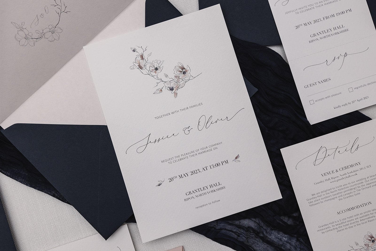 Grace collection as a navy suite,  with blush envelope liner