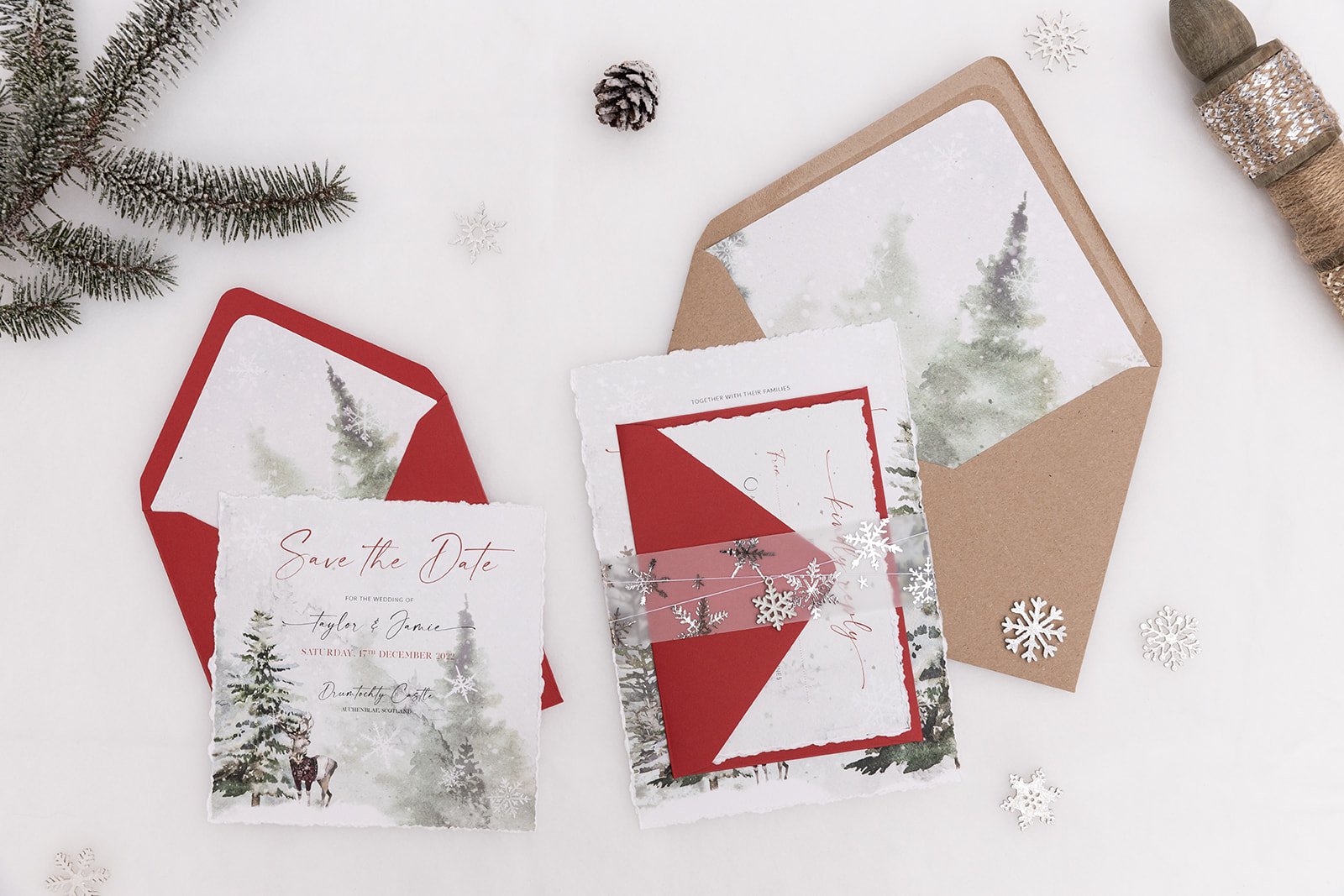Winter Frost Charmed Invite™ with mix-and-match envelopes and silver-foiled snowflakes vellum belly band with enamelled snowflake charm