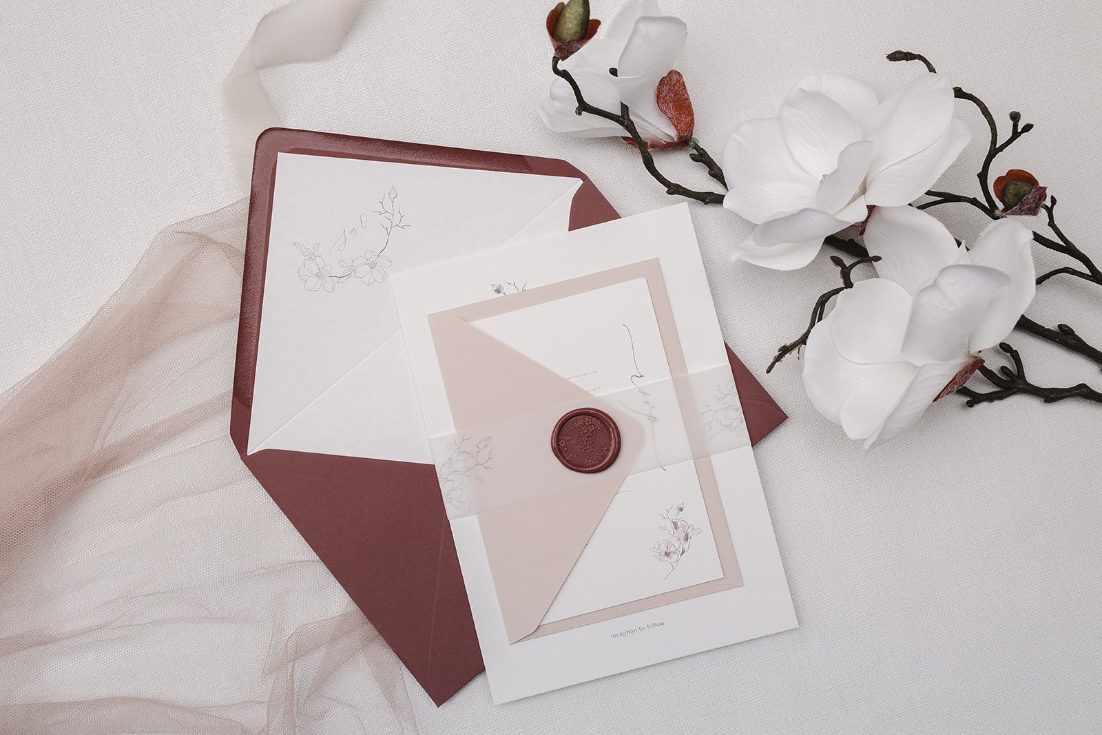 Day invite with Rosebud envelope and white liner, Blush RSVP envelope, and vellum belly band with Bouquet design wax seal in 'Rose'
