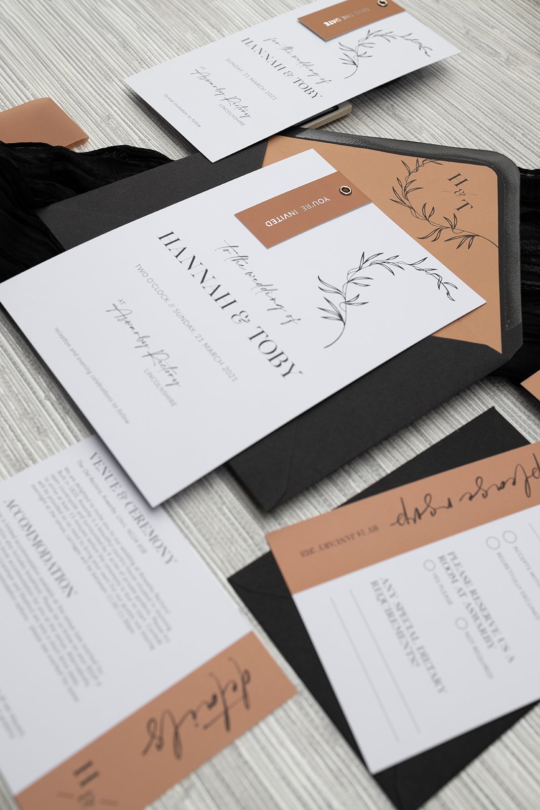 Minimalist Luxe collection in 'Terracotta' with silver-foiled tags.