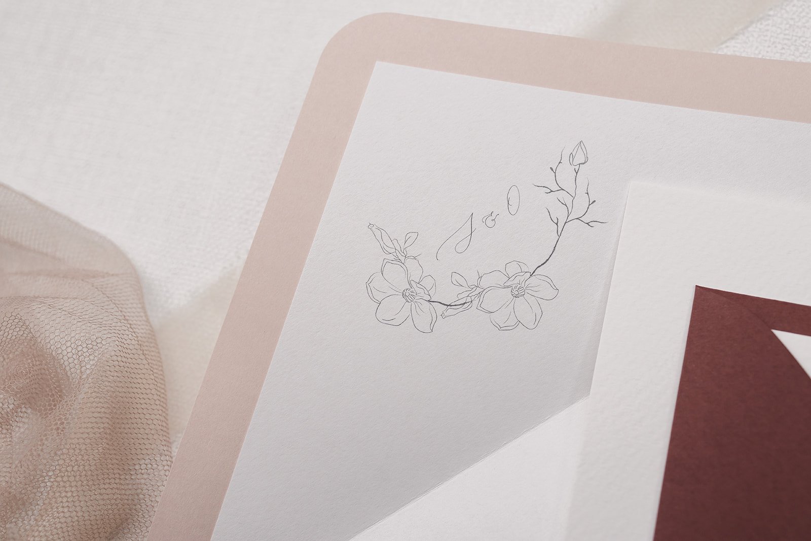 Illustrated and monogrammed envelope liner in white