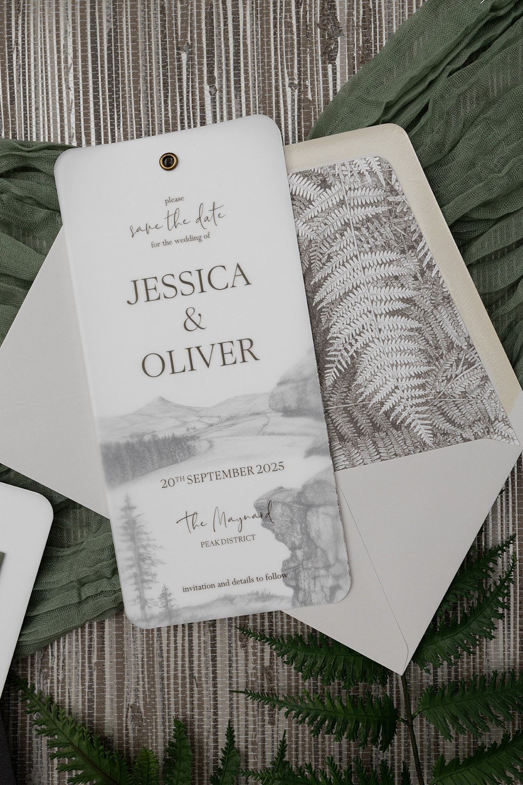 Majestic Peak Save the Date with 'Limestone' envelope and bronze ferns liner.