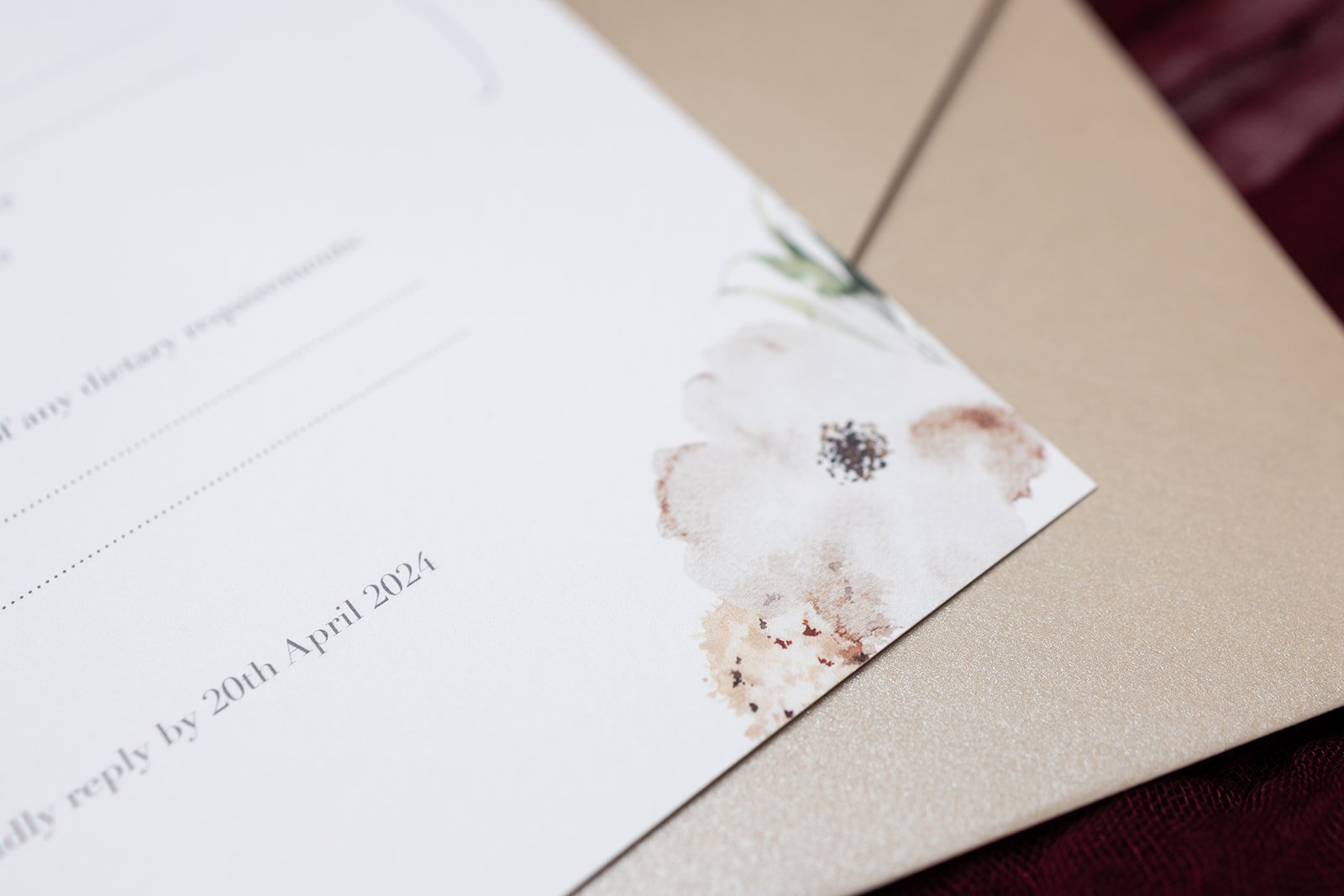 Close up of RSVP illustration and 'Sheen' envelope