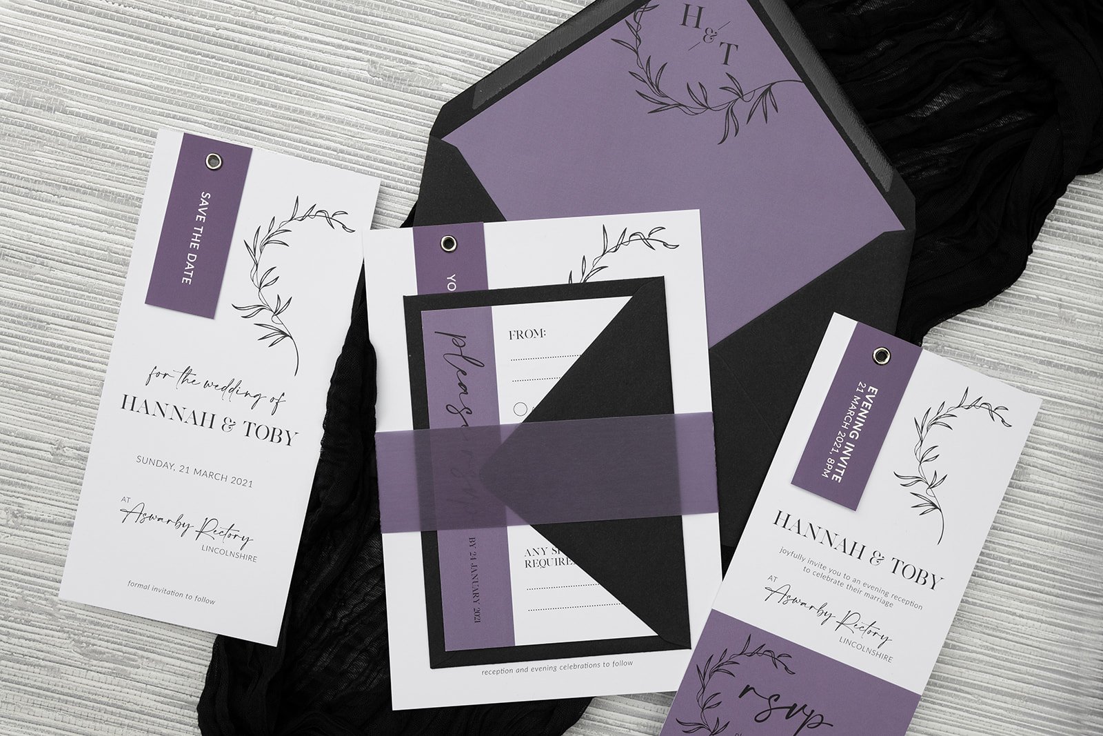 Minimalist Luxe collection in 'Heather', with silver-foiled tags, wrapped with matching vellum belly band, and Rich Black envelope.