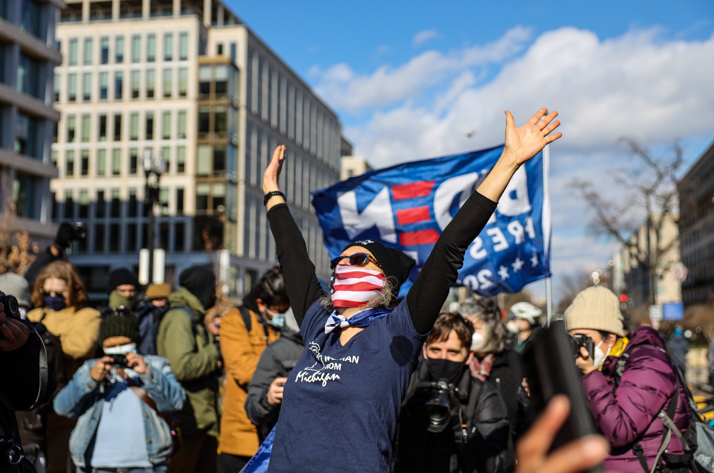 Liane Kufchock, of Farmington Hills, Michigan, celebrates at Black Lives Matter Plaza in Washington, D.C. following Joe Biden's inauguration speech on January 20, 2021.
Inauguration Day 2021 was unlike any other in history due to the raging coronav