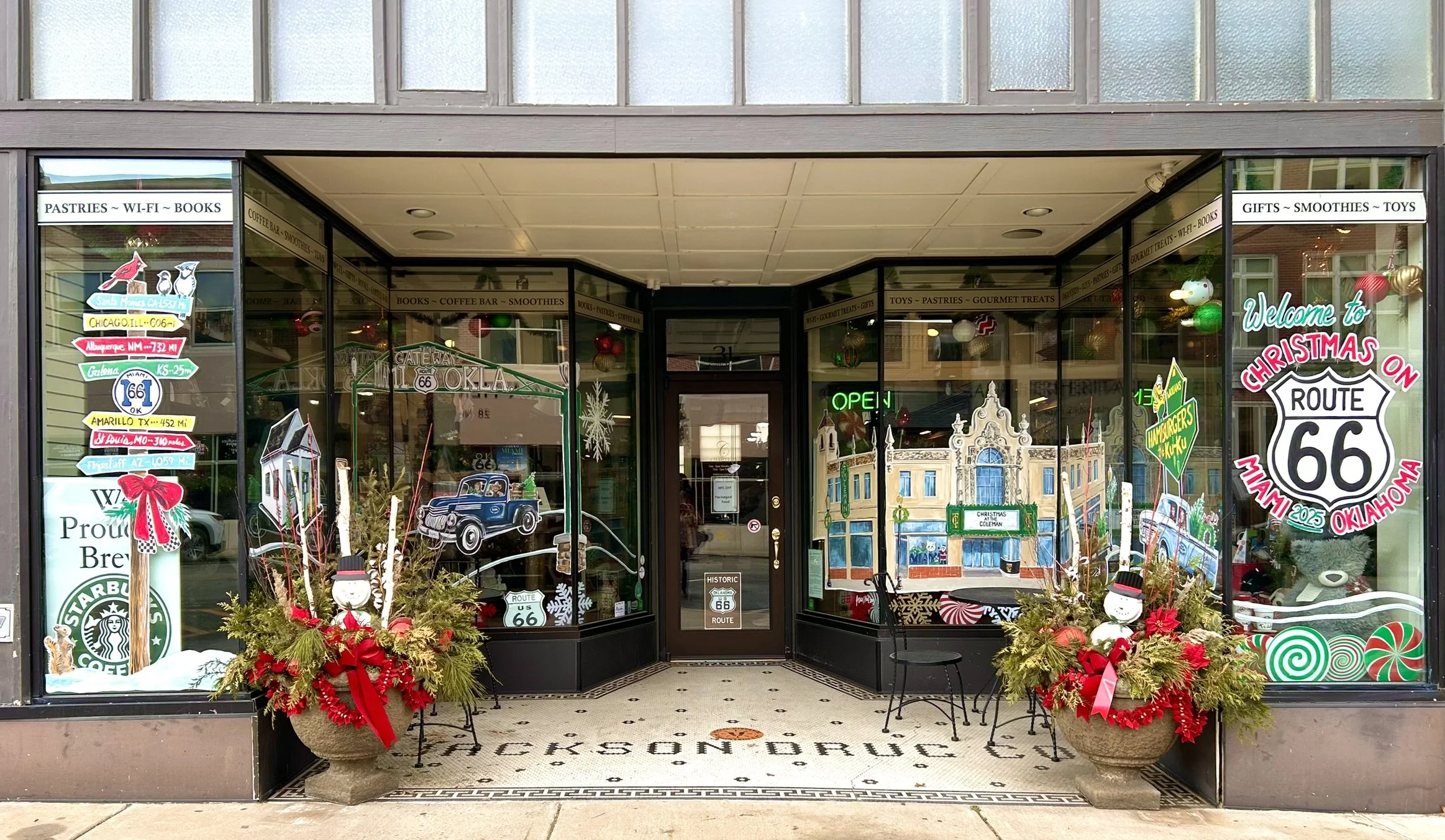 Holiday Windows for Chapters in Downtown Miami OK, featuring local Route 66 landmarks and notable community volunteers. 2025.